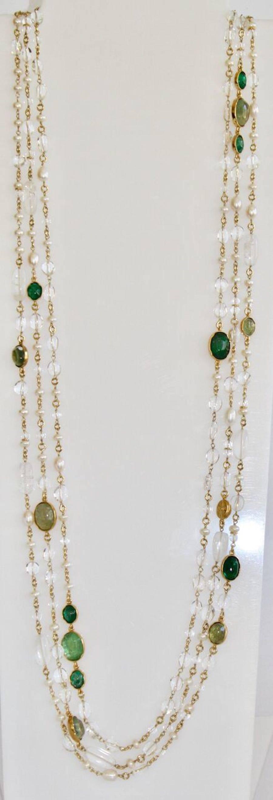 Goossens Paris triple row necklace with clear rock crystals, hand tinted green rock crystals, and natural pearls. Item can be worn long or can be doubled and turned into a luxurious 6 row necklace. 

50
