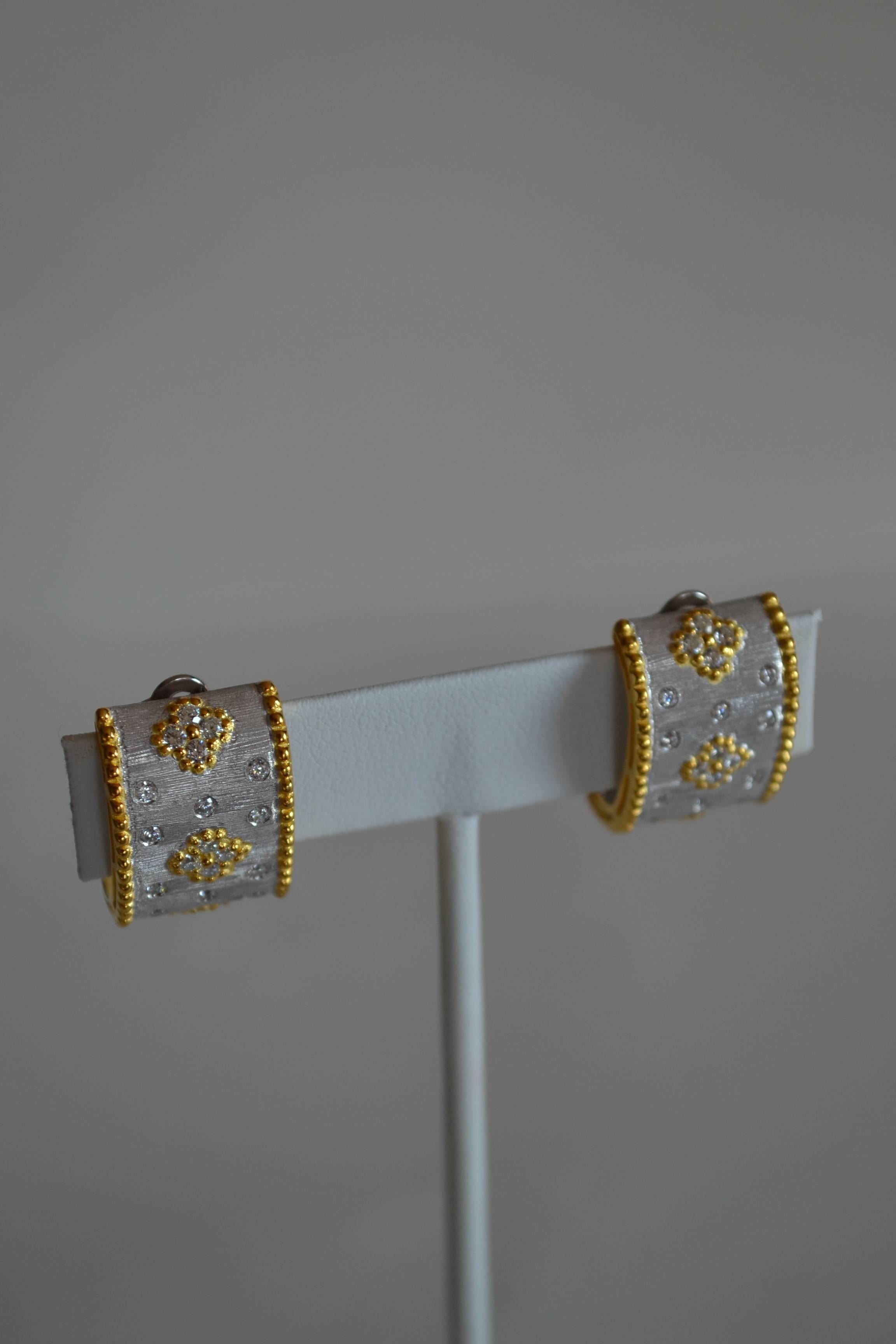 CZ clover pattern C shape clip earrings in gold and rhodium plate from Bijoux Num. 

1