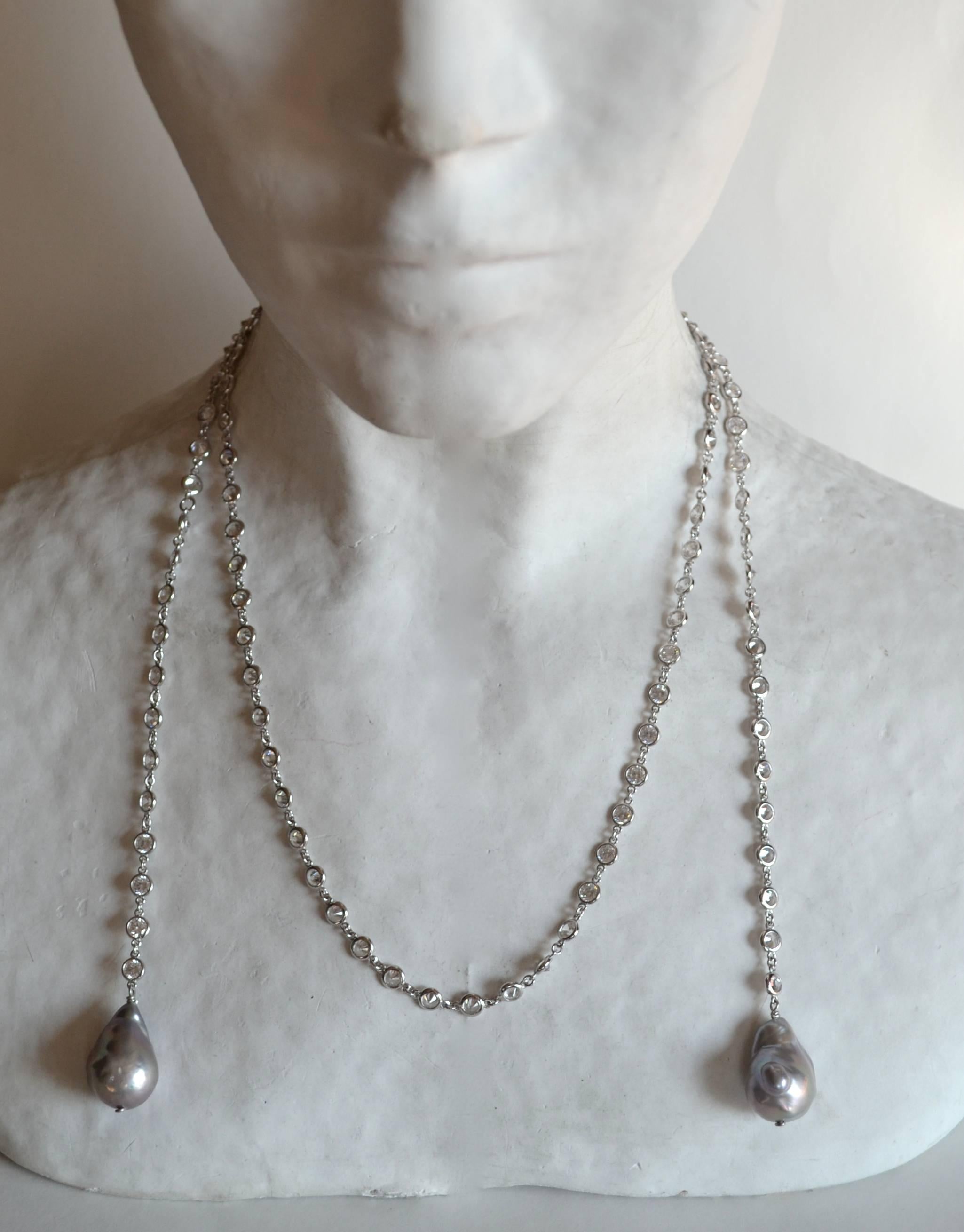 Cubic Zirconia lariat necklace in rhodium plate with Baroque Pearl drops from Bijoux Num. 