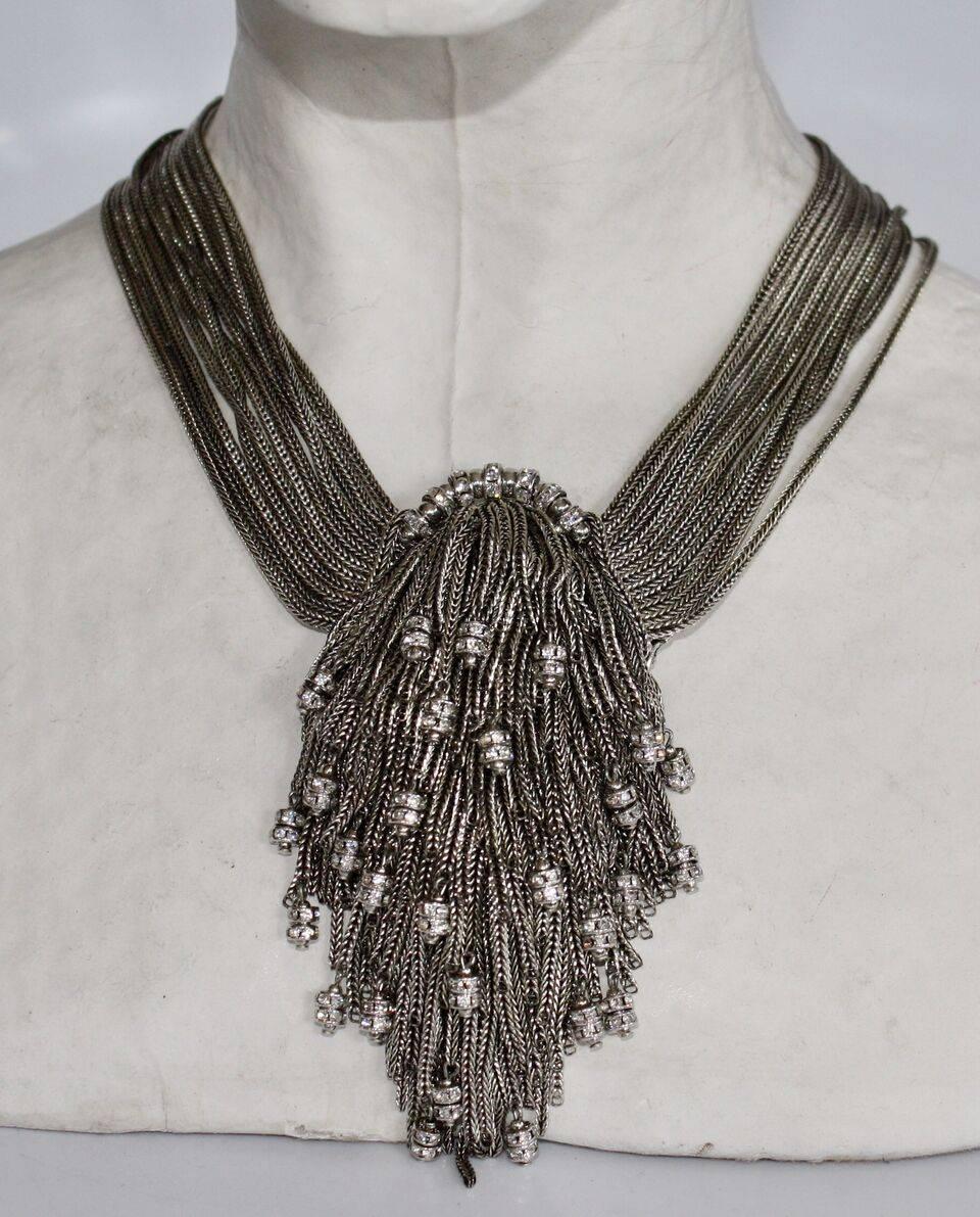 Cascading multi-chain rhodium Simba necklace with Swarovski Crystal drops from Francoise Montague. 
