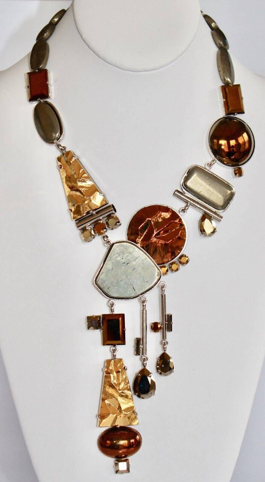 Pyrite, glass cabochon, and Swarovski crystal drop necklace from Philippe Ferrandis. 