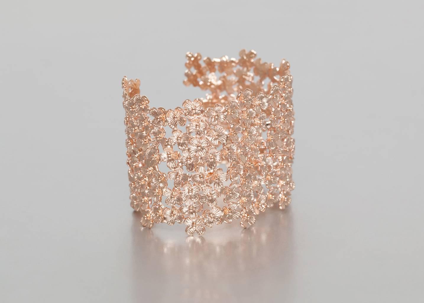 Cuff bracelet from Ambre & Louise gilded with 18 carat rose gold. 
Adjustable size, 1.5” wide , 7” around expandable.