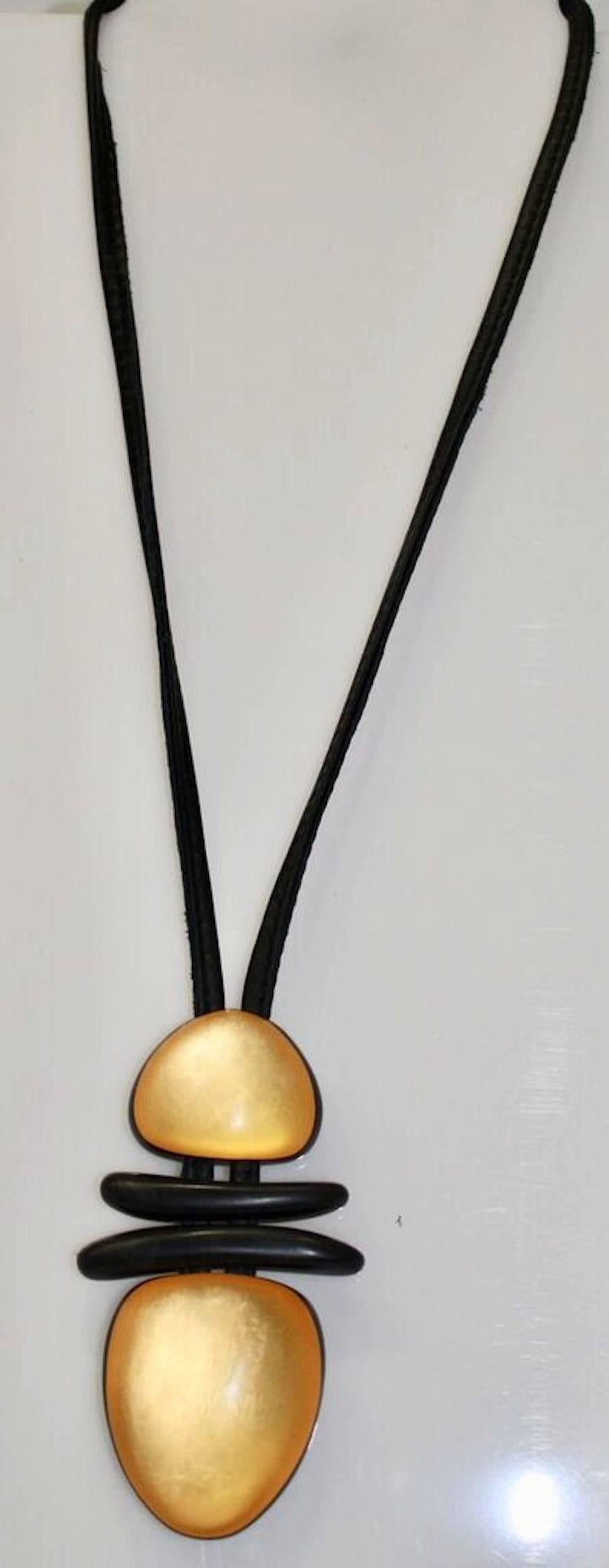 Monies Leather, Wood, and Acrylic Gold Pendant Necklace In New Condition In Virginia Beach, VA