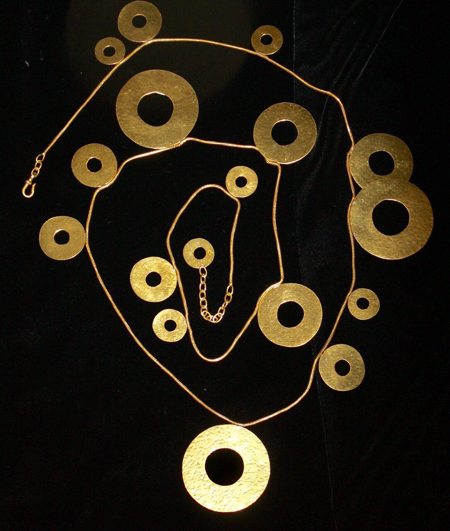 Sautoir necklace in gold plated brass from Herve van der Straeten. A fabulous collectors item! Smallest circle is 1.75