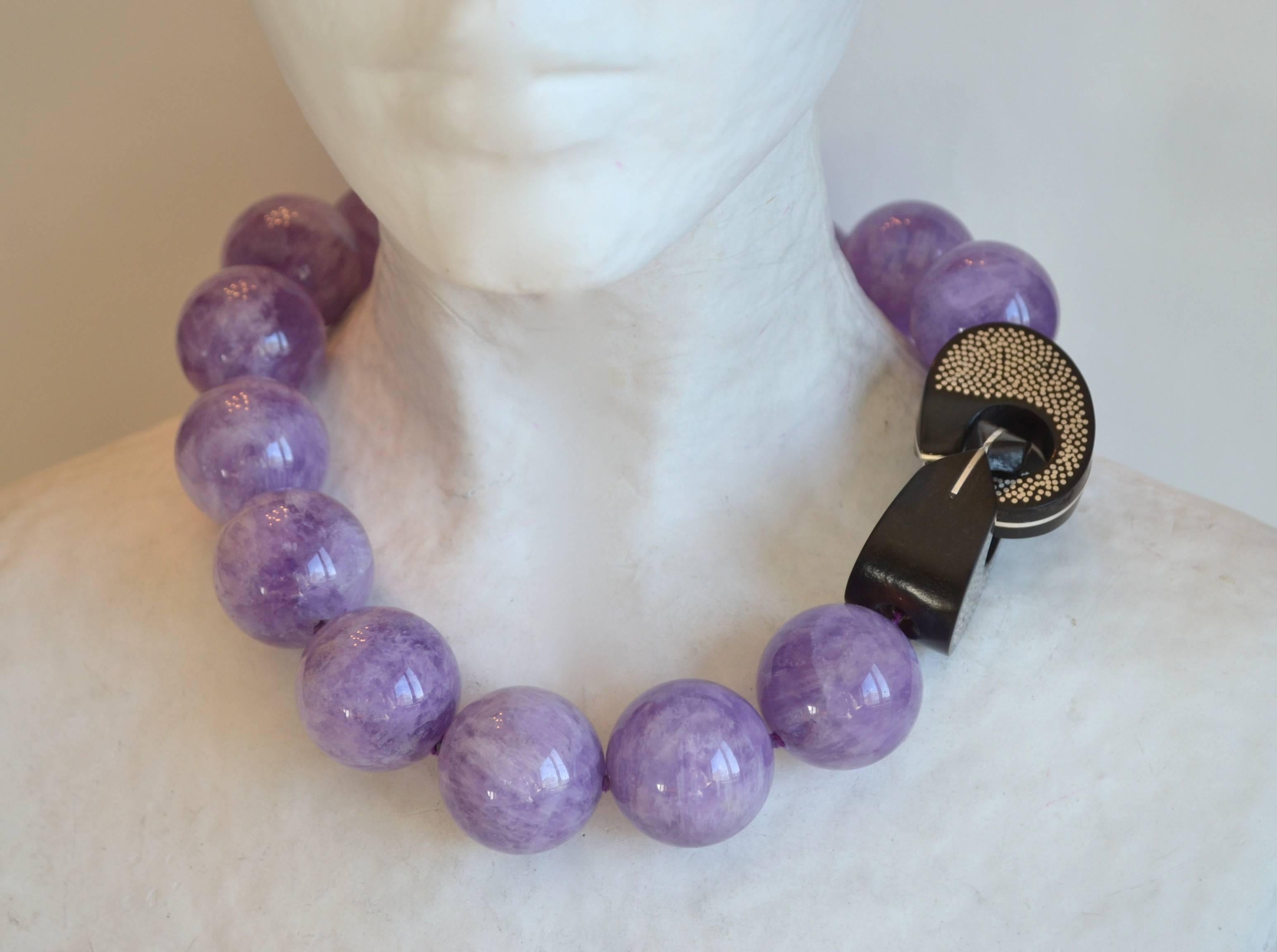 Large amethyst bead necklace with cocobolo wood and silver inlay clasp from Patricia von Musulin. 