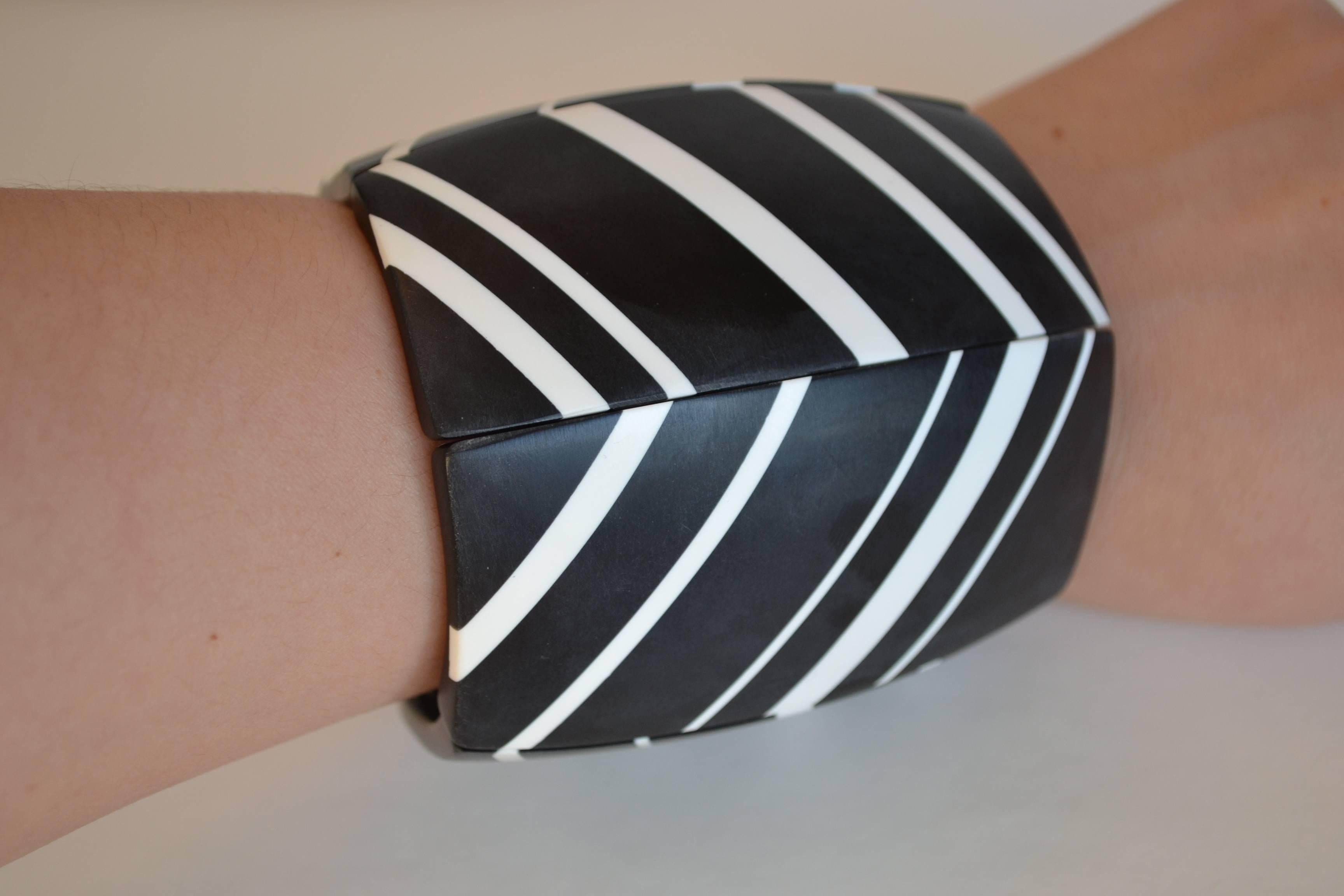 Modern wood bracelet in black and white stripes from Danish design house Monies. Bracelet is on elastic and can stretch to fit most wrist sizes. 