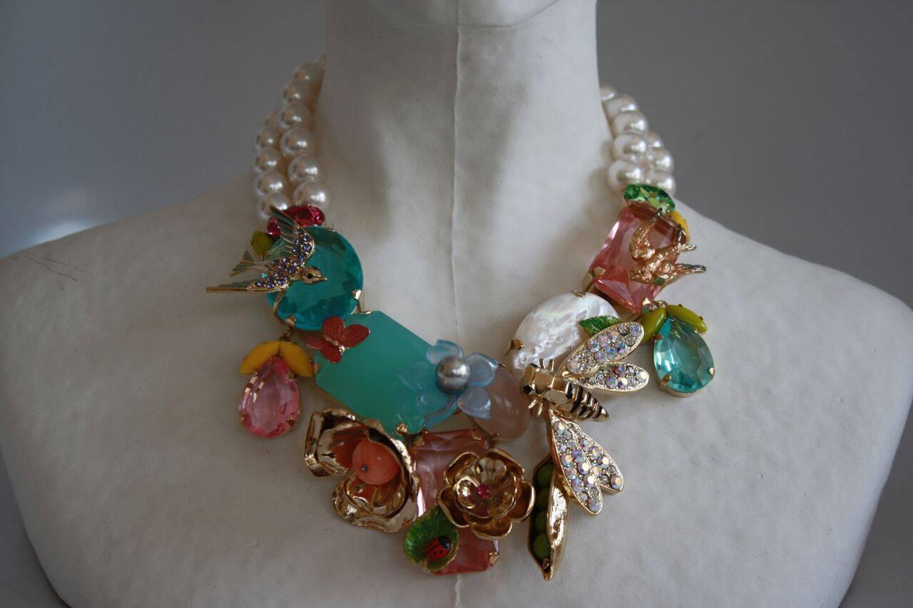 Statement necklace from Philippe Ferrandis made with glass, resin, enamel and multicolored Swarovski crystals. 