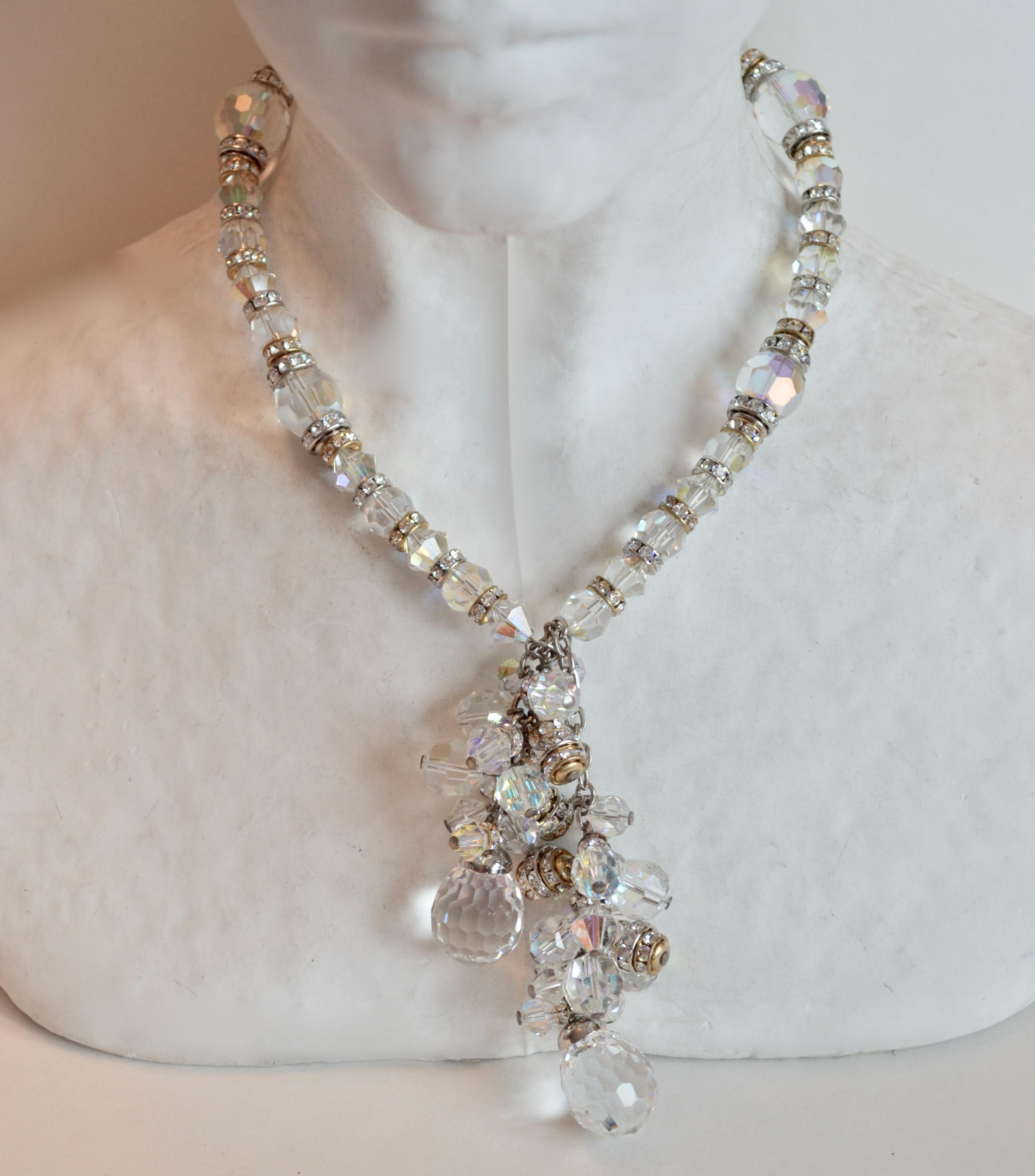 Alternating iridescent glass beads and clear Swarovski crystals are strung on memory wire in this lariat necklace from Francoise Montague. The tassel lariat can be tied and twisted a number of ways creating a decorative front closure. 