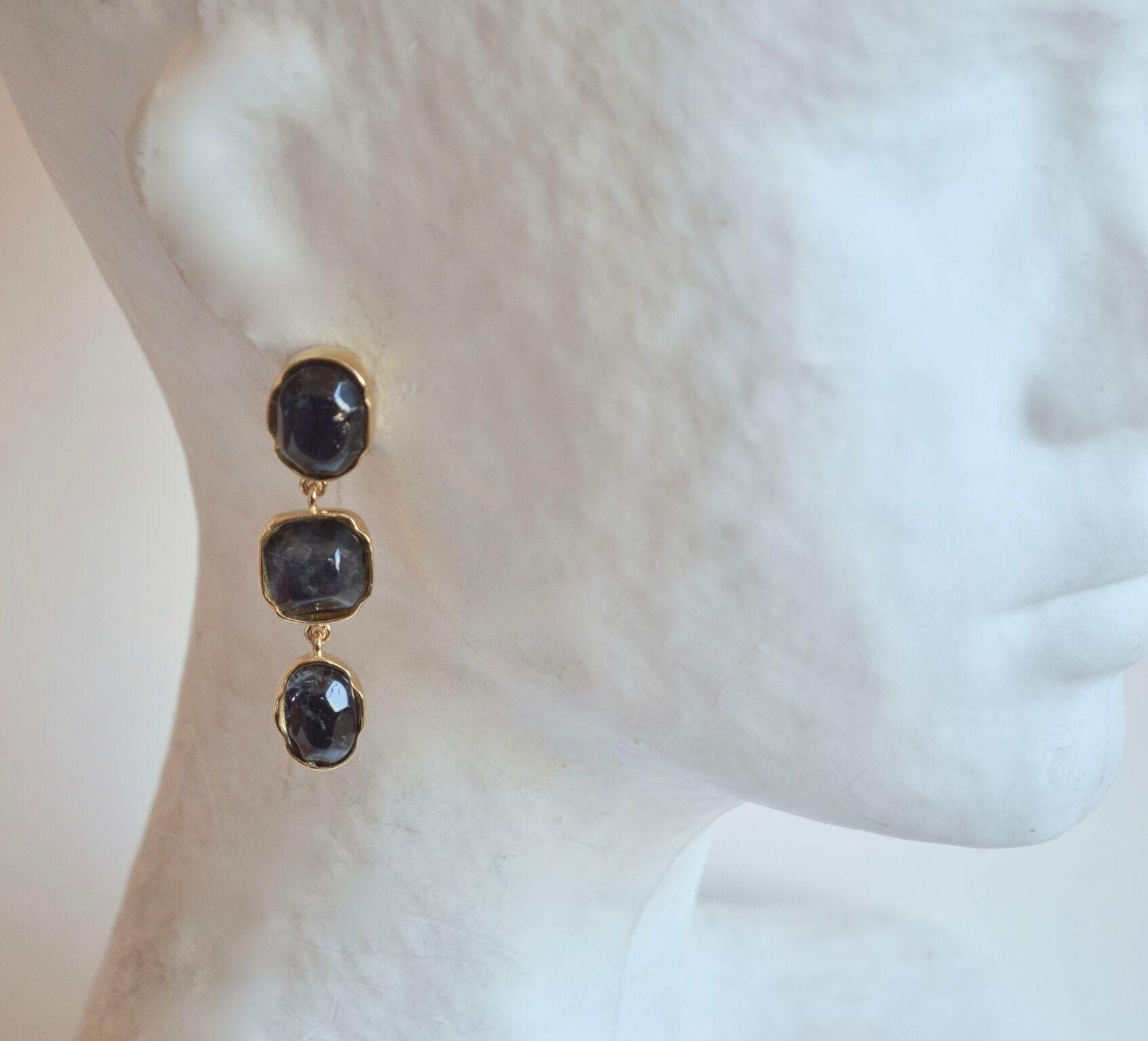Goossens Paris hand tinted rock crystal drop clip earrings in dark blue with 24K yellow gold plated brass. 
