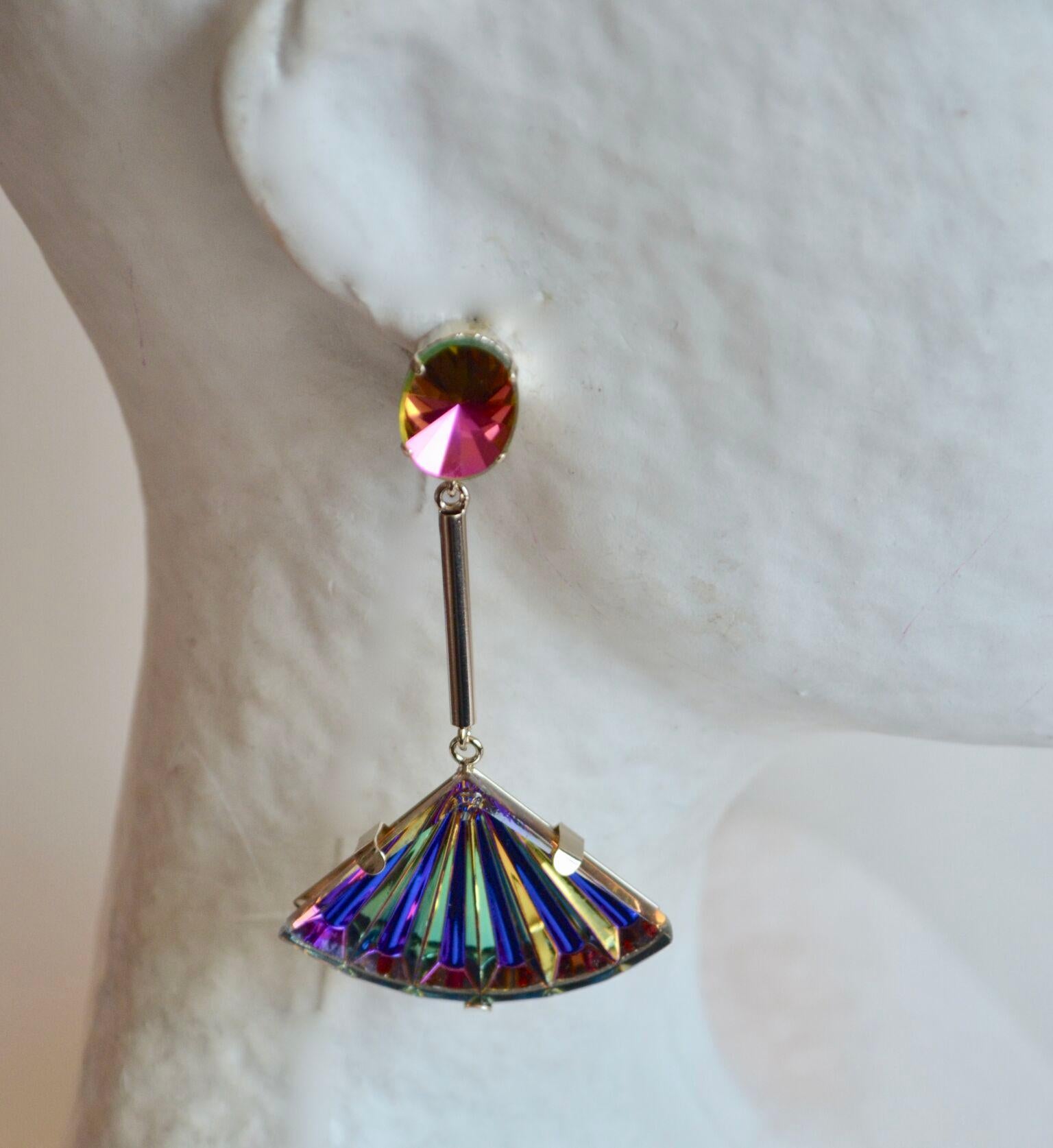 Philippe Ferrandis vintage glass fan and Swarovski crystal clip earrings in pink and purple. 