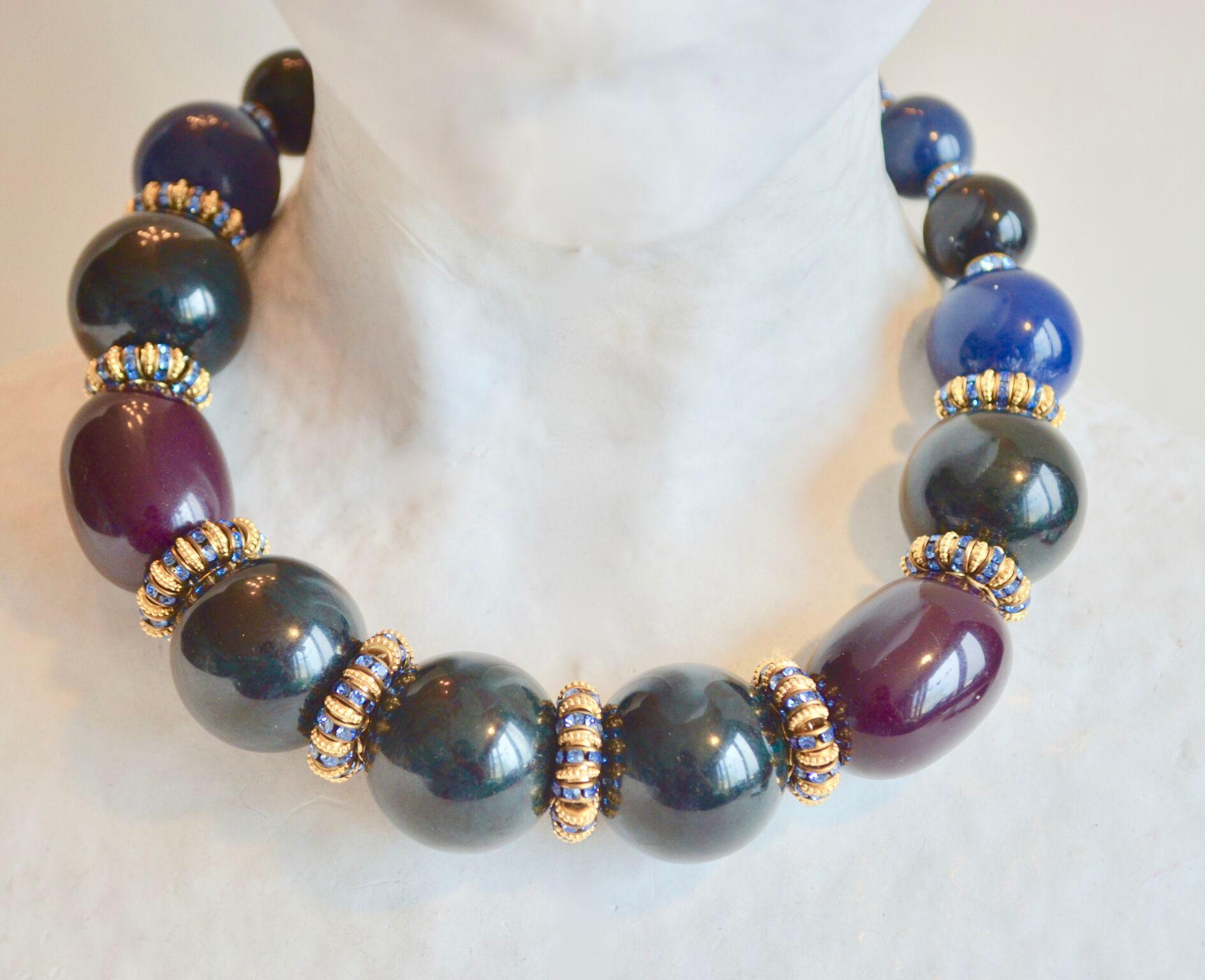 Gorgeous glass bead necklace in blue, green, and burgundy with interspersed Swarovski crystal rondelles from Francoise Montague. 