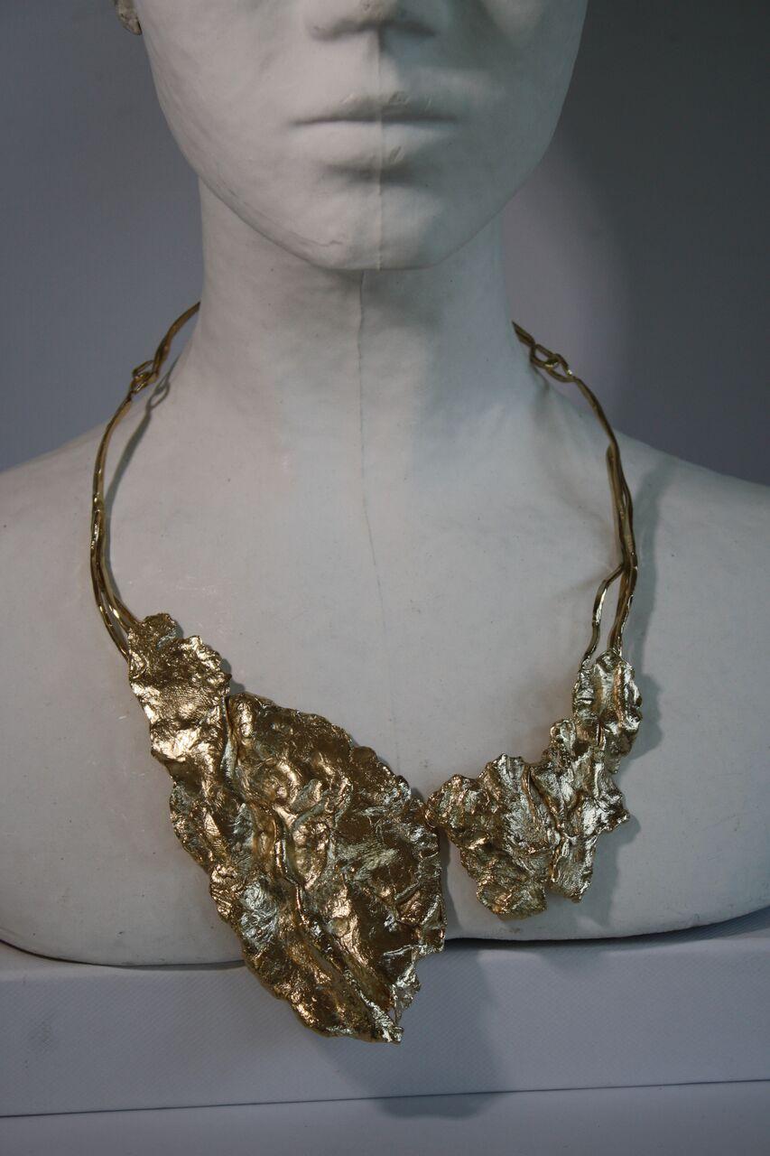 Stunning modern necklace brass plated in 18 carat pale gold.
Front hook closure.