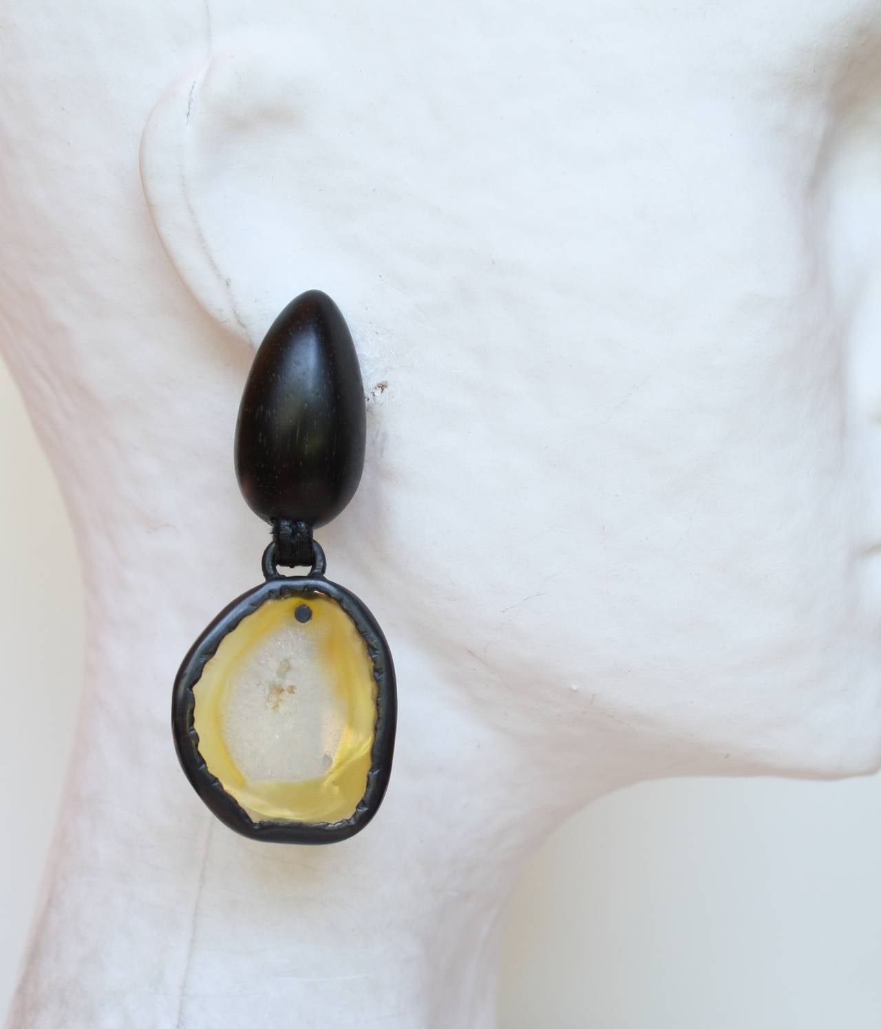 Quintessential boho chic yellow agate and Ebony wood clip earrings from Monies. One-of-a-kind. 

Please note, as in nature, the agate slices on these earrings are not identical (we think this is the best part!). 

3.25