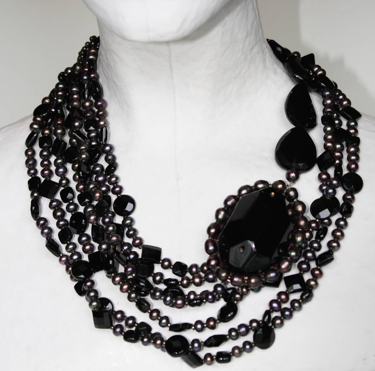 Multi strand biwa pearl necklace with black onyx beads from Italian designer Daniele Cornaggia.