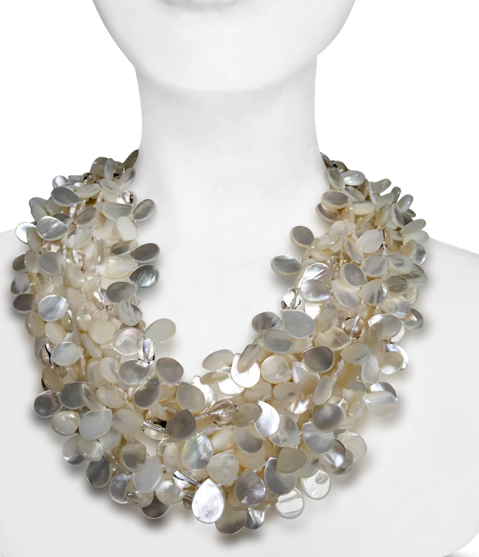 The finest quality mother of pearl beads are hand strung on Japanese silk and finished off with a decorative lucite clasp in this six strand necklace from Patricia Von Musulin.

Current collection

Designer biography:

Dedicated to