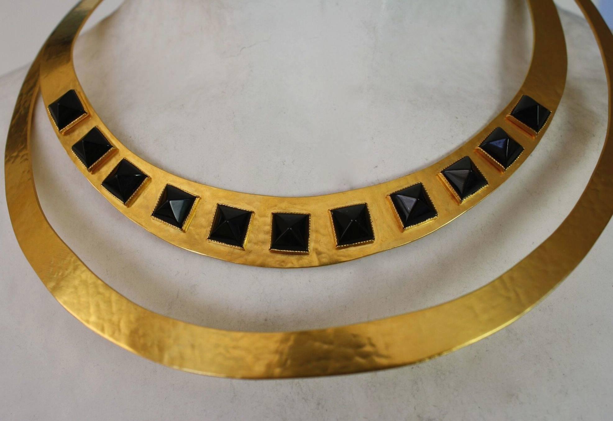 Hand hammered gold plated brass and black onyx stud torque necklace from Herve Van Der Straeten. 

Designer Biography:

Hervé Van der Straeten was born in 1965 and is an independent artist-designer. Having first become known for his jewellery