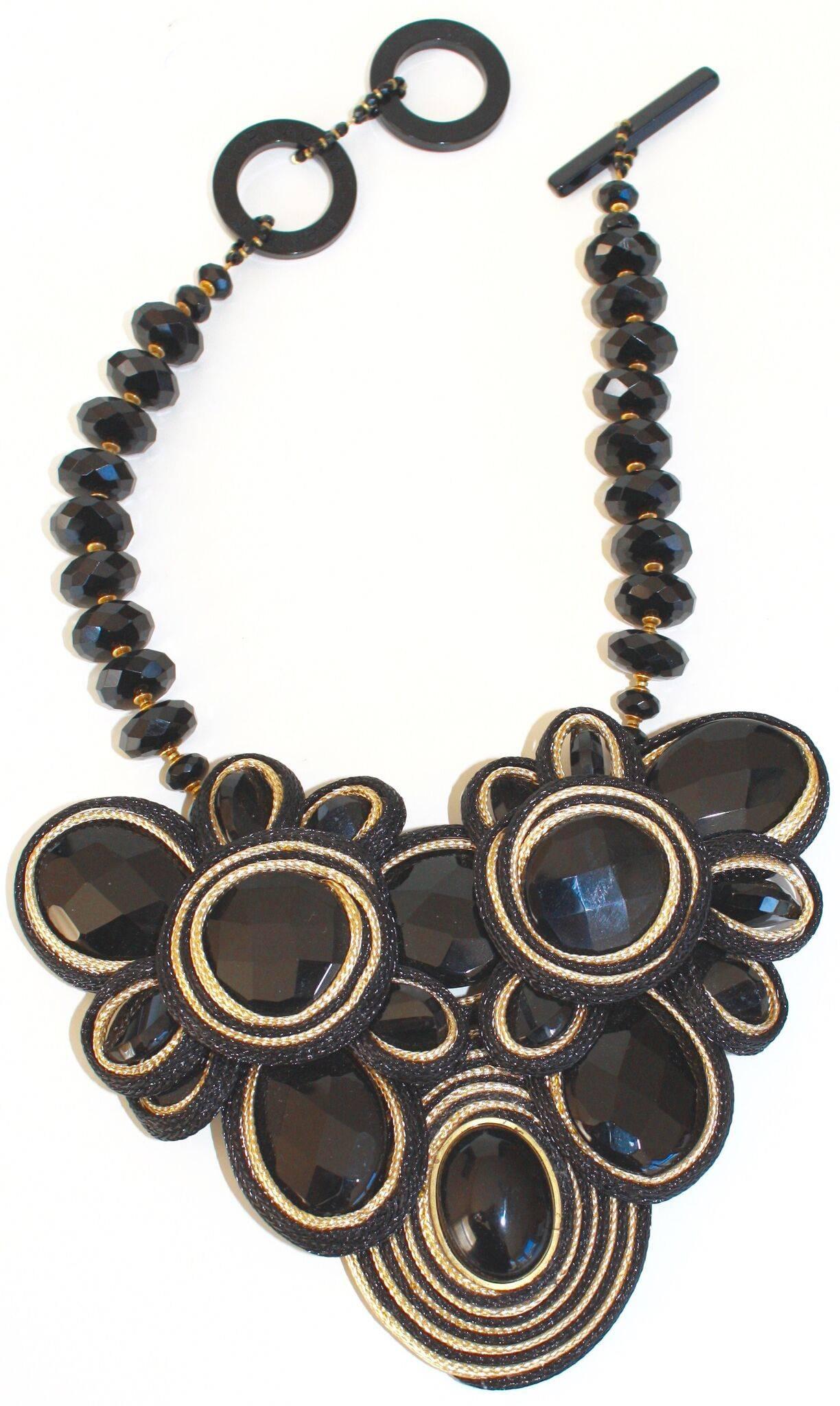 Magnificent and unique statement necklace made with cording and black onyx from Daniele Cornaggia. 

Necklace is 17