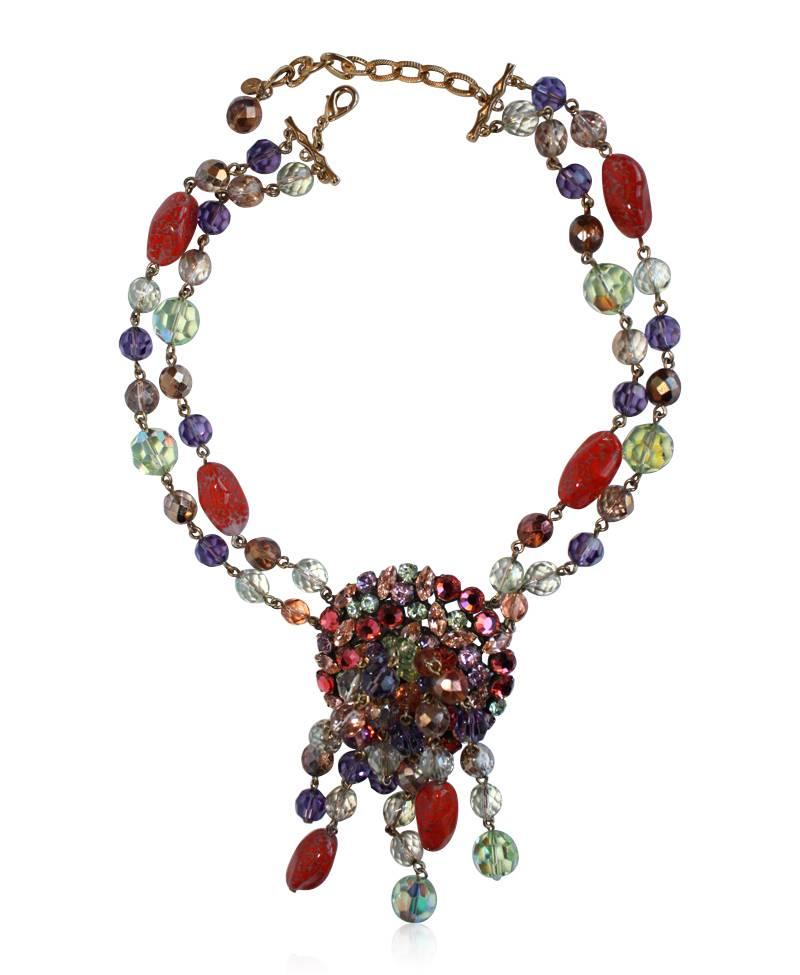 Francoise Montague short tassel necklace in a mix of orange, purple, grey, and green glass and crystal beads.

16.5" W with 3" available chain extension
Drop with circle is 5" L