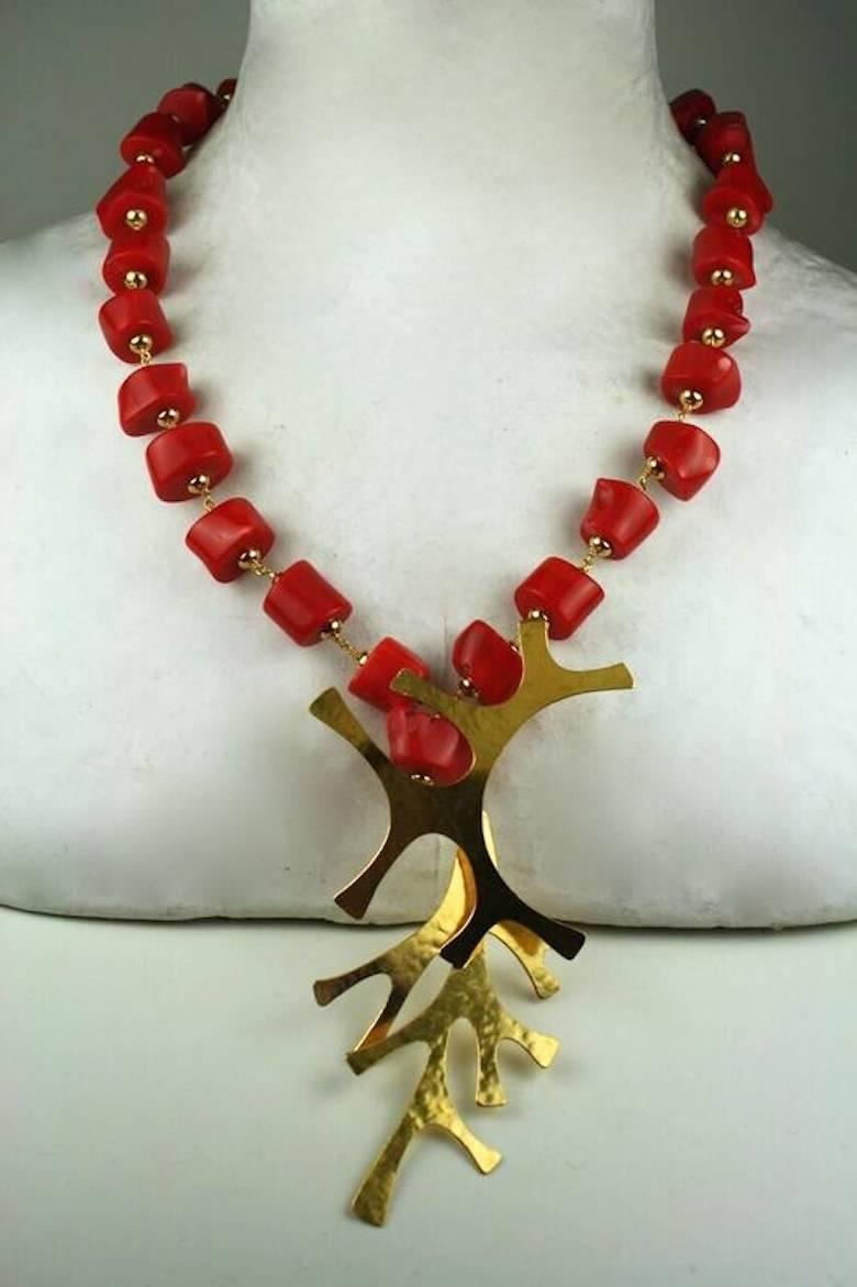 Coral bead and gilded bronze coral motif pendant necklace from Herve van der Straeten. 

20