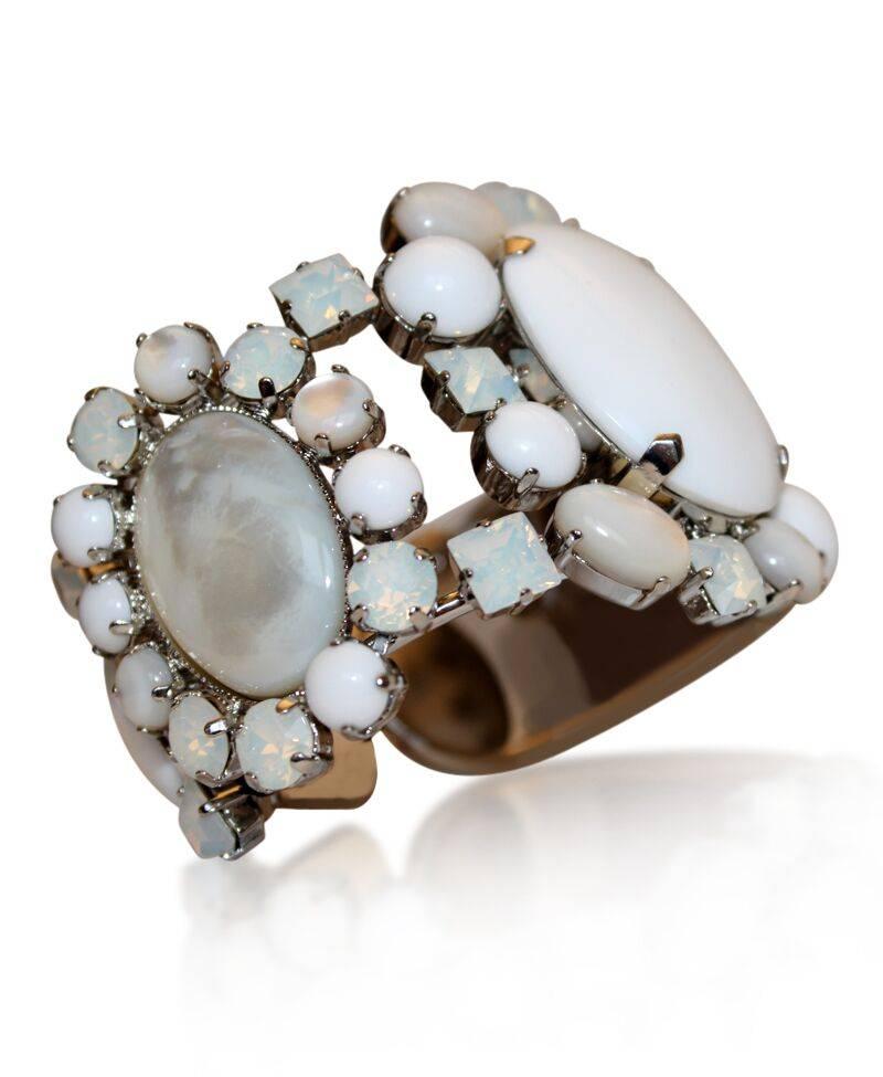 White and opaline glass and Swarovski crystal cuff bracelet from Philippe Ferrandis. Cuff is malleable and adjusts to fit both small and large wrists. 