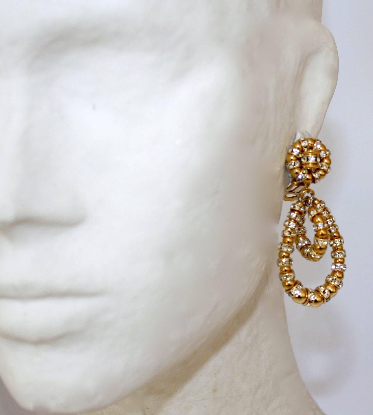 The iconic Lolita clip earrings from Francoise Montague in gold and crystal rondelles. 