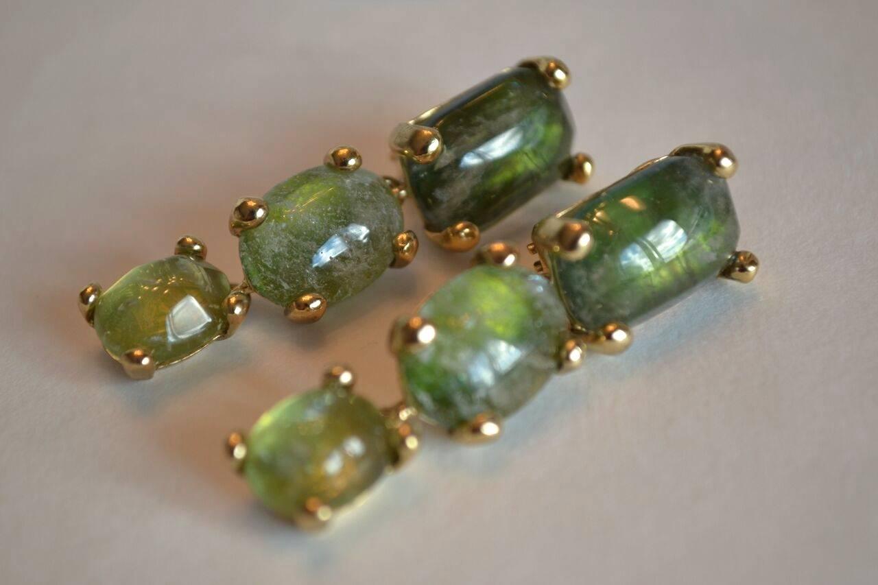 Hand tinted rock crystal drop clip earrings from Goossens Paris. Each stone is a unique shade of green and the earrings are incredibly light weight. 

Metal is 24 carat gold plated bronze