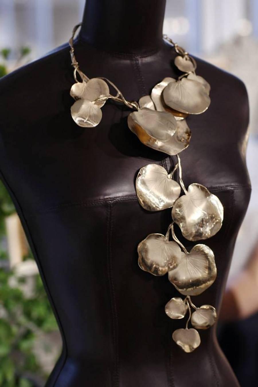 18 carat fine gold plated statement necklace from Amber & Louise. Lightweight and handmade in Paris, this necklace can be worn long as pictured and can also be worn shorter as the bottom portion is removable. 