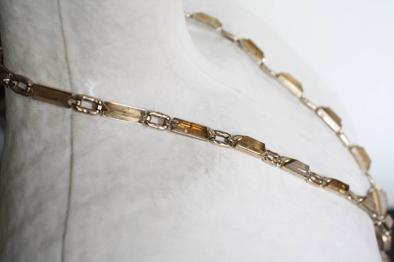 Citrine baguettes are set in 24k pale gold plated brass on this subtle and sexy 