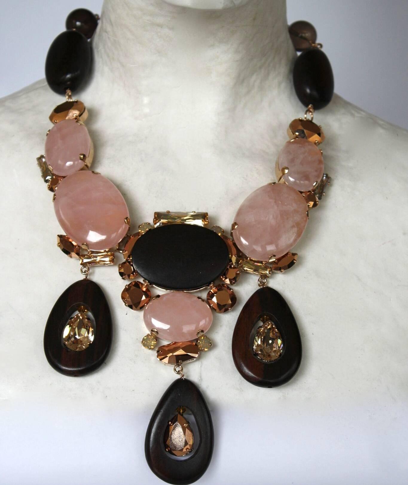 Brown and pink glass cabochon, wood, and Swarovski Crystal large triple drop  necklace from Philippe Ferrandis. 