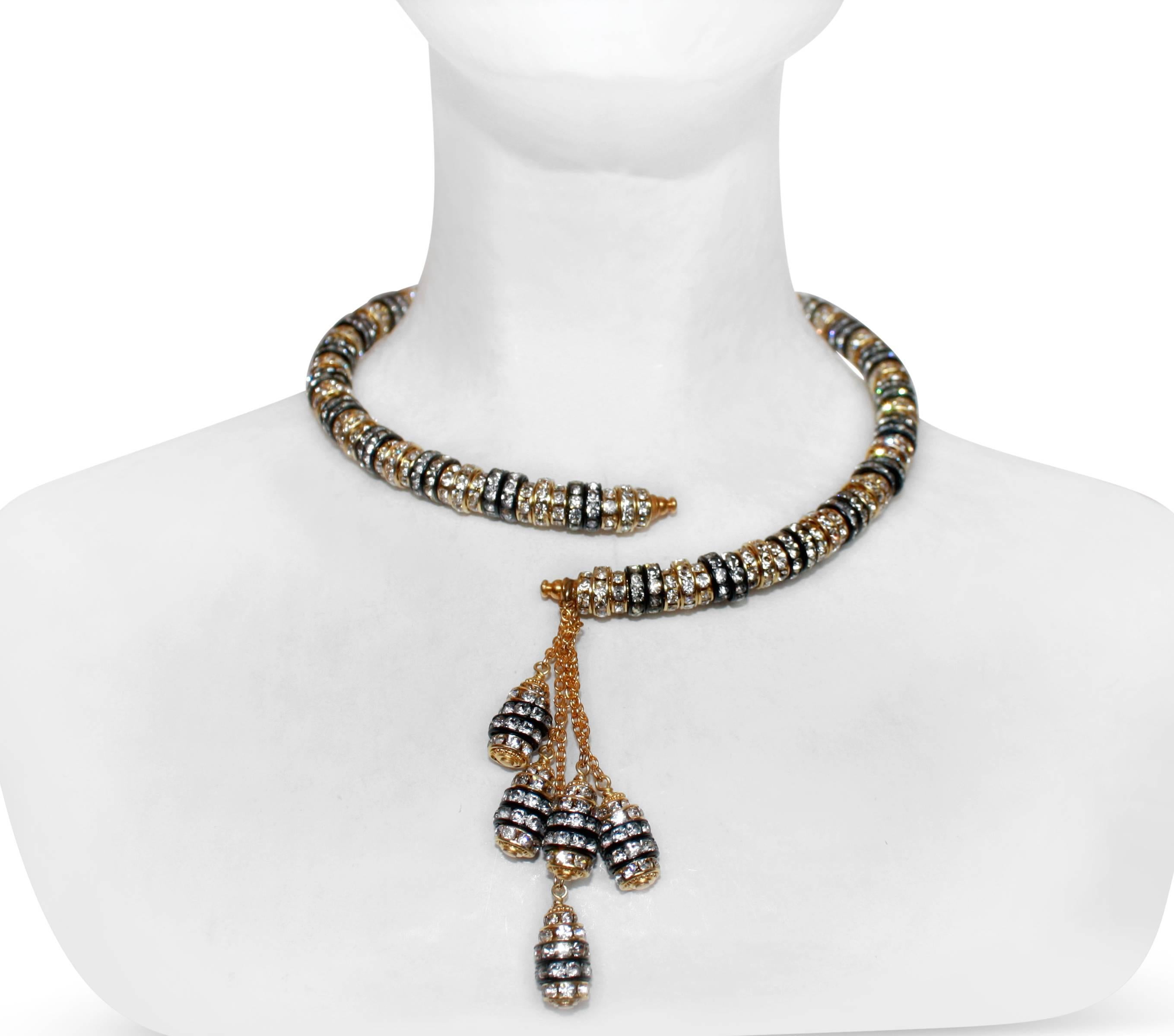 Swarovski Crystal rondelles set in a mix of yellow gold and rhodium are strung on molded wire, creating an easy to wear and elegant necklace from Francoise Montague.