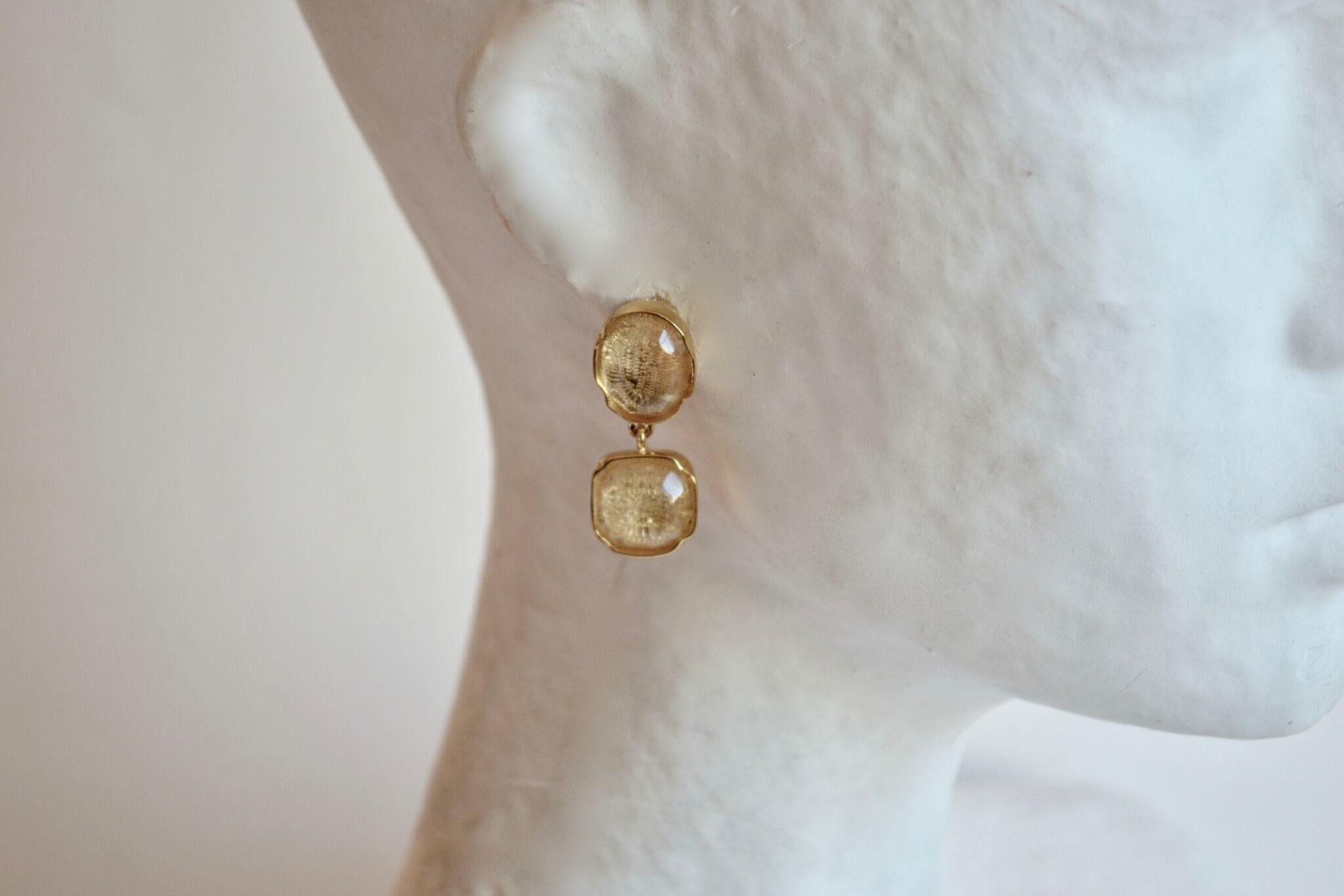 Clear rock crystal clip earrings from Goossens Paris' Fall 2018 collection. 

1.5