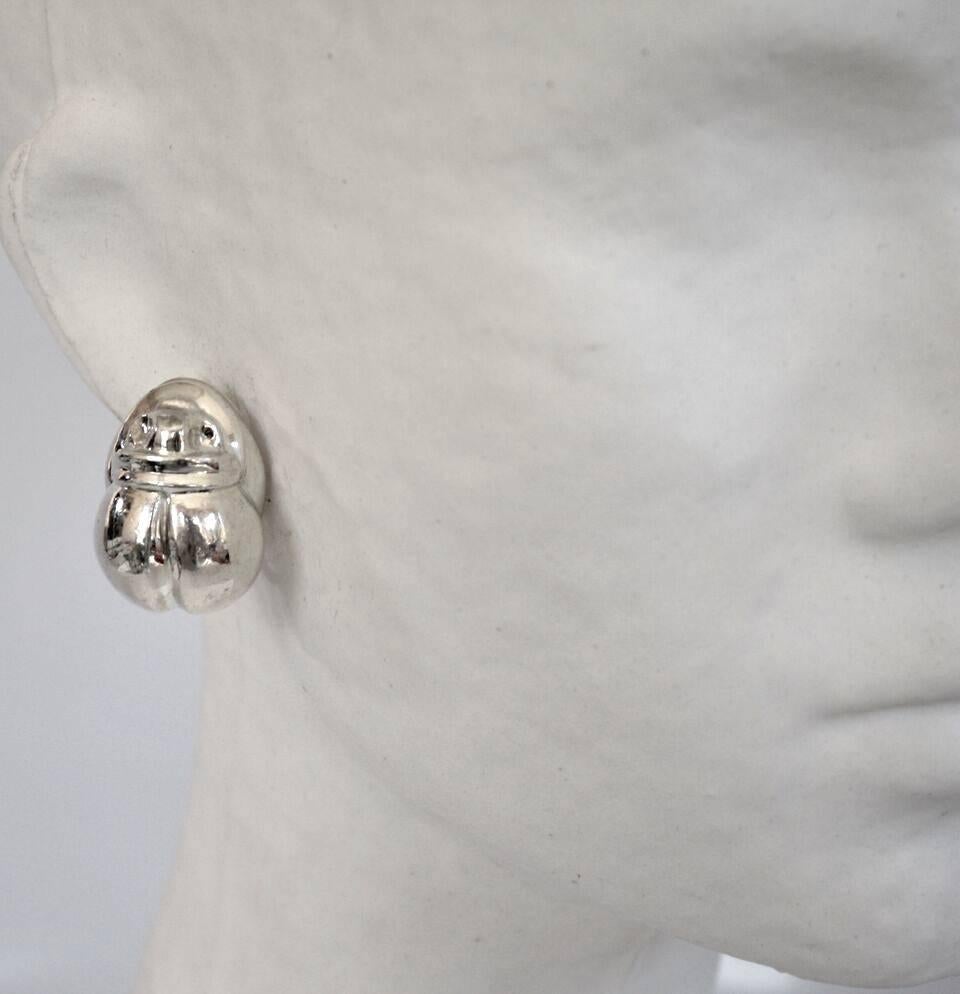 Solid sterling silver scarab clip earrings from designer Patricia von Musulin. 