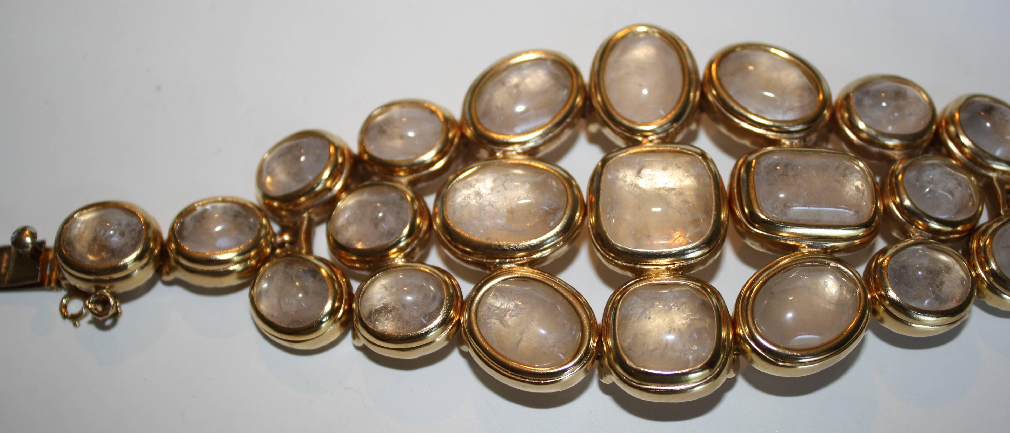 Goossens Paris clear rock crystal bracelet set in pale gold. Decorative finish on reverse side. 

6.75
