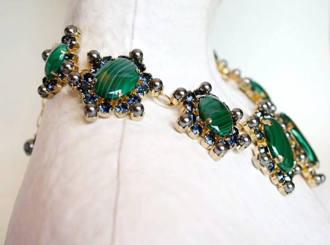 Gold metallic treatment, malachite, glass pearl, and Swarovski crystal necklace from Philippe Ferrandis. 

15” wide with 3.75” extra chain

Designer Biography:

Philippe Ferrandis has been designing costume fashion jewelry and accessories