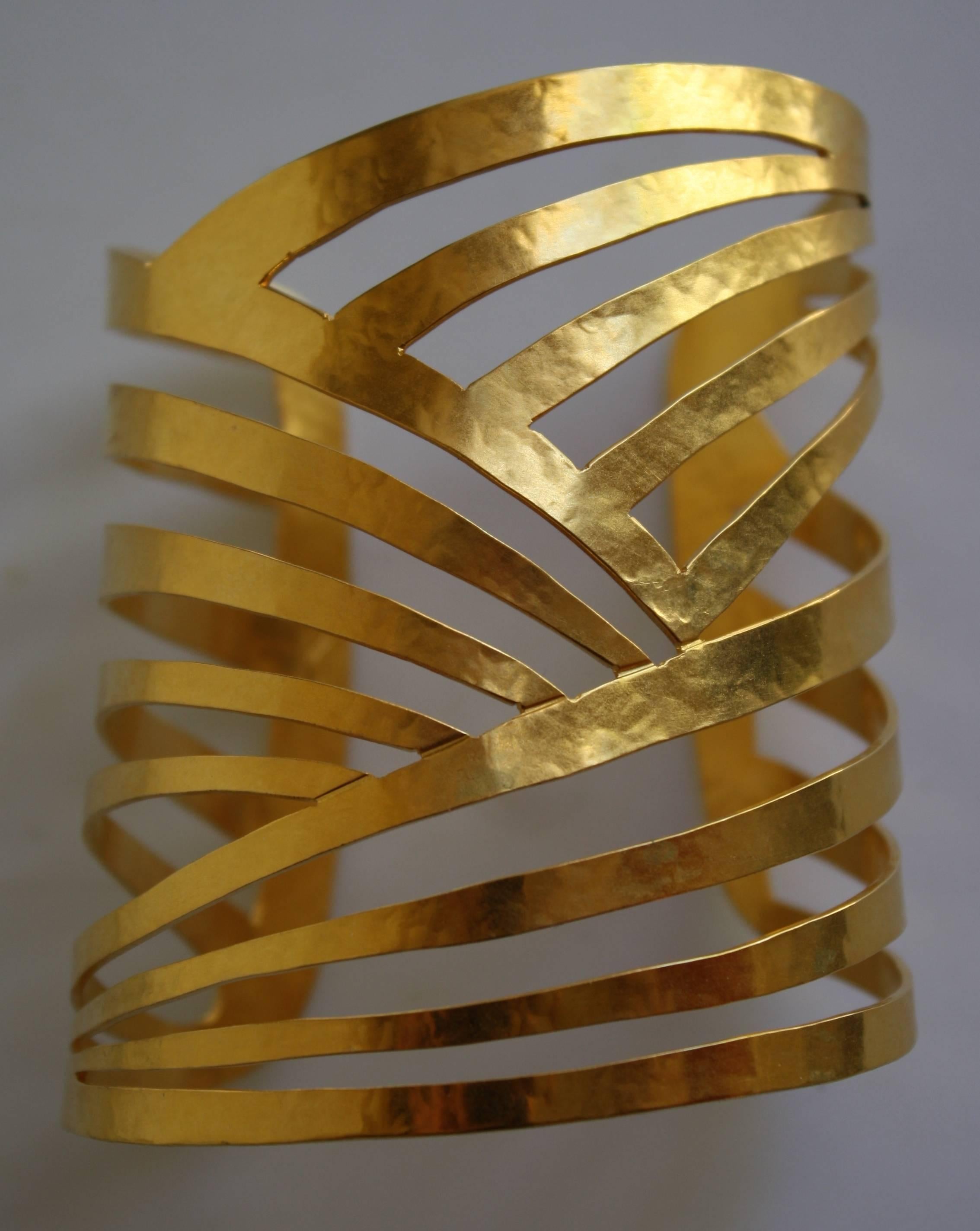 Hand hammered asymmetrical cutout cuff from Herve van der Straeten. Gold plated brass is very soft, making it very easy to adjust the size to your wrist. 

Designer Biography:

Hervé Van der Straeten was born in 1965 and is an independent