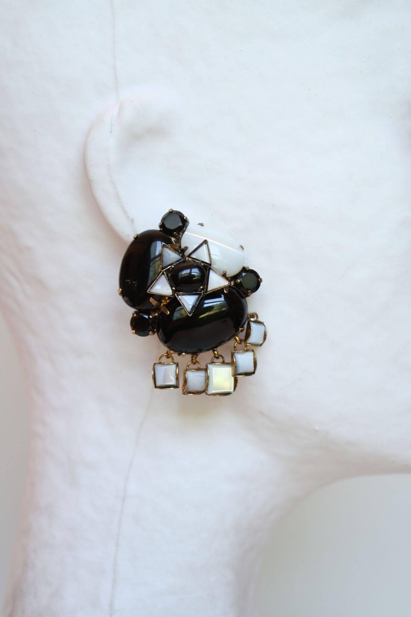 Mother of pearl and black onyx triangle star center clip earrings from Iradj Moini. 

1.5
