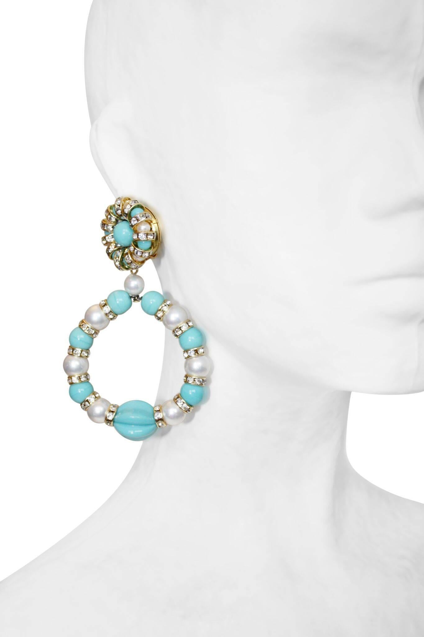 Glass pearl, faux turquoise, and Swarovski crystal rondelle statement clip earrings from Francoise Montague. 

Designer Biography:

La maison Françoise Montague has been recognized and respected in the world of haute couture costume jewelry