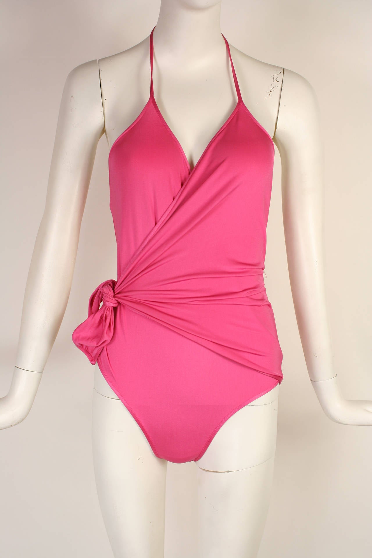 Early Gianni Versace 1970s Pink Wrap Bathing Suit.
Wraps at hips. New condition with tags. Size 42/ fits small to medium.

This item has stretch
Bust 33