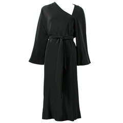 Halston 1970s Black Silk Dress with Asymmetrical Neckline