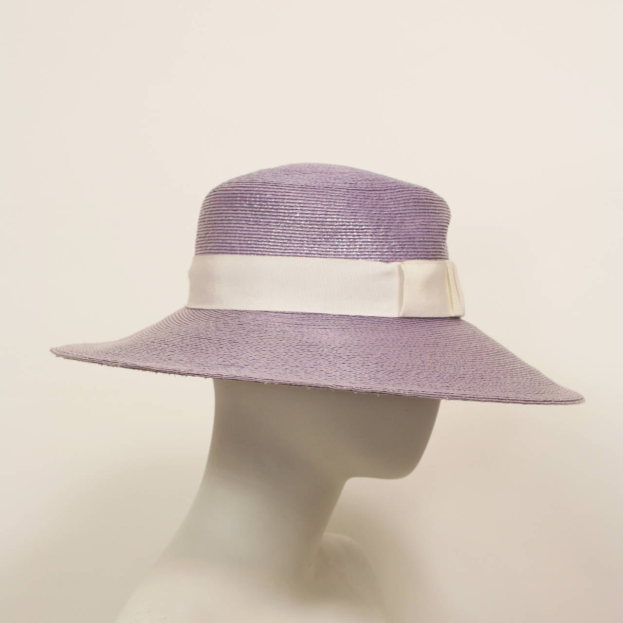 Yves Saint Laurent Runway Hat
Fine Raffia woven hat with beautiful purple-lavender glaze.
Fits head size small to medium.
Excellent condition.