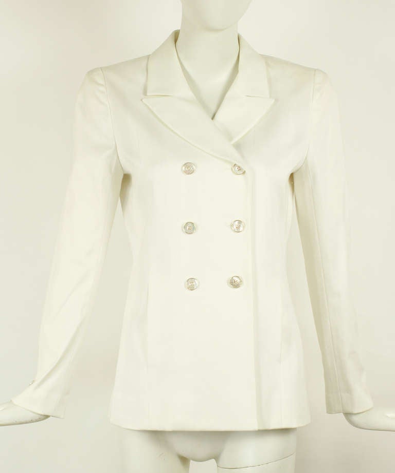 Chanel Off-White Jacket Blazer

Beautifully tailored double breasted Blazer. Front pockets. Mother of pearl buttons with Chanel Paris engraved. Excellent condition. 

Size 40

Bust 36