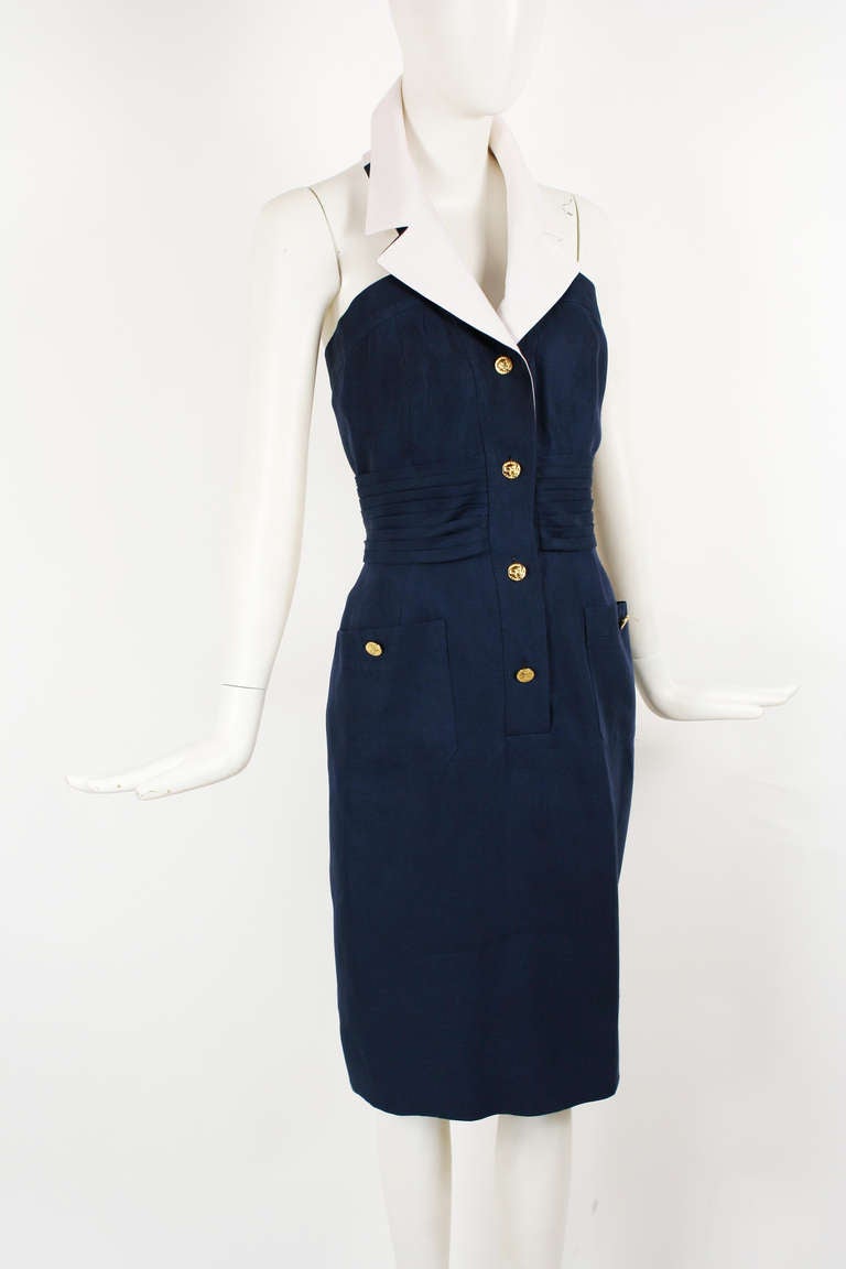 Chanel Blue and White Dress
Gorgeous classic Chanel nautical inspired linen dress. White halter neckline. Corset and boning in the interior. 
Coco Chanel profile buttons
Excellent condition.

French Size. 40
Bust 36