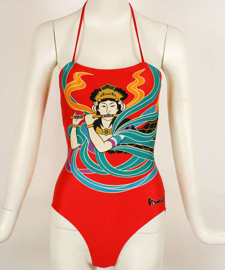 Kansai Yamamoto Swim Suit
Graphic wrap around print with flute player. Signed Kansai on suit.
Excellent condition.
Fits extra small to small. Has stretch.