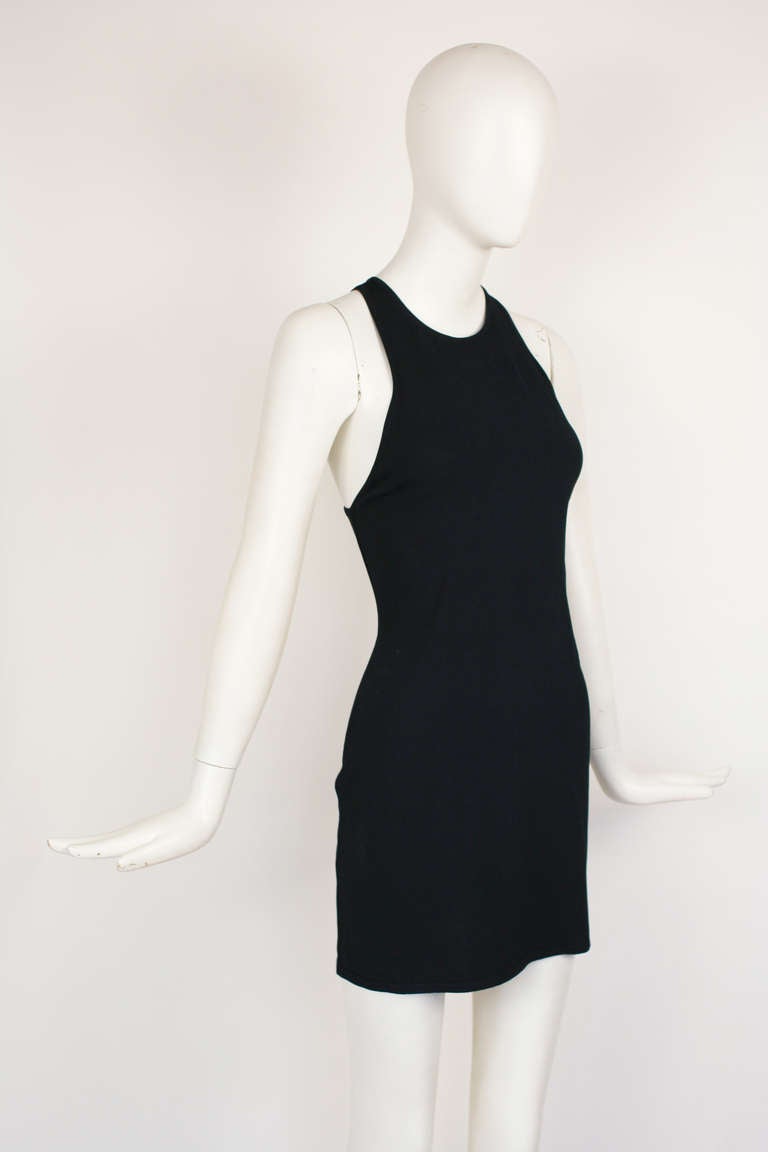 Tom Ford for GUCCI

Sexy black body con dress with racerback and gucci clasp in back. Dating from 1998. Size 44. Stretch rayon/polyester blend. 

Bust: 36