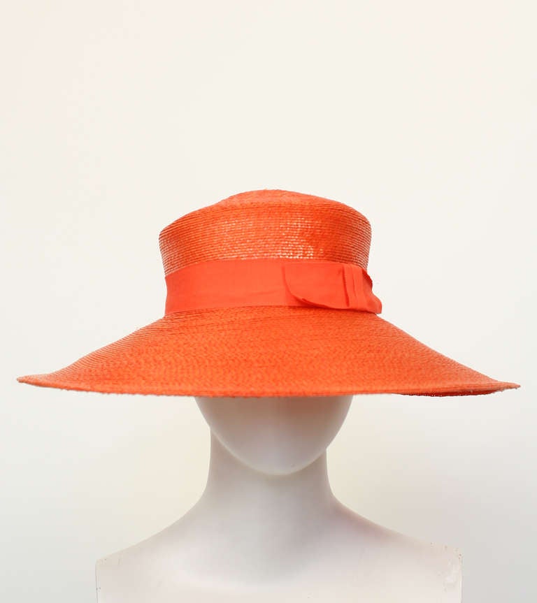Yves Saint Laurent Runway Hat
Fine Raffia woven hat with beautiful tangerine glaze.
Fits head size small to medium.
Excellent condition.