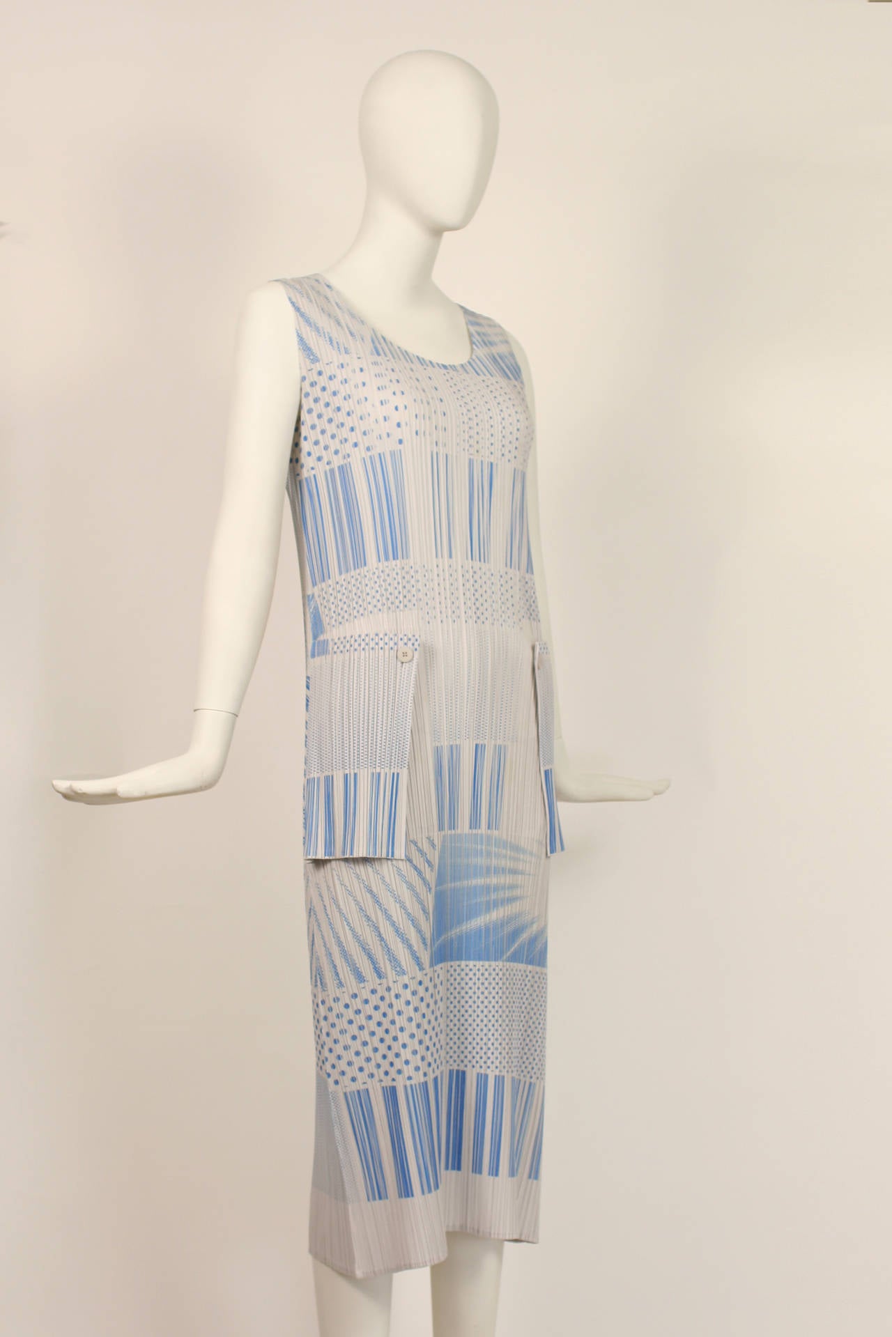 Pleats Please Issey Miyake Blue and White Summer Dress
Excellent condition and will fit xs to medium sizes.