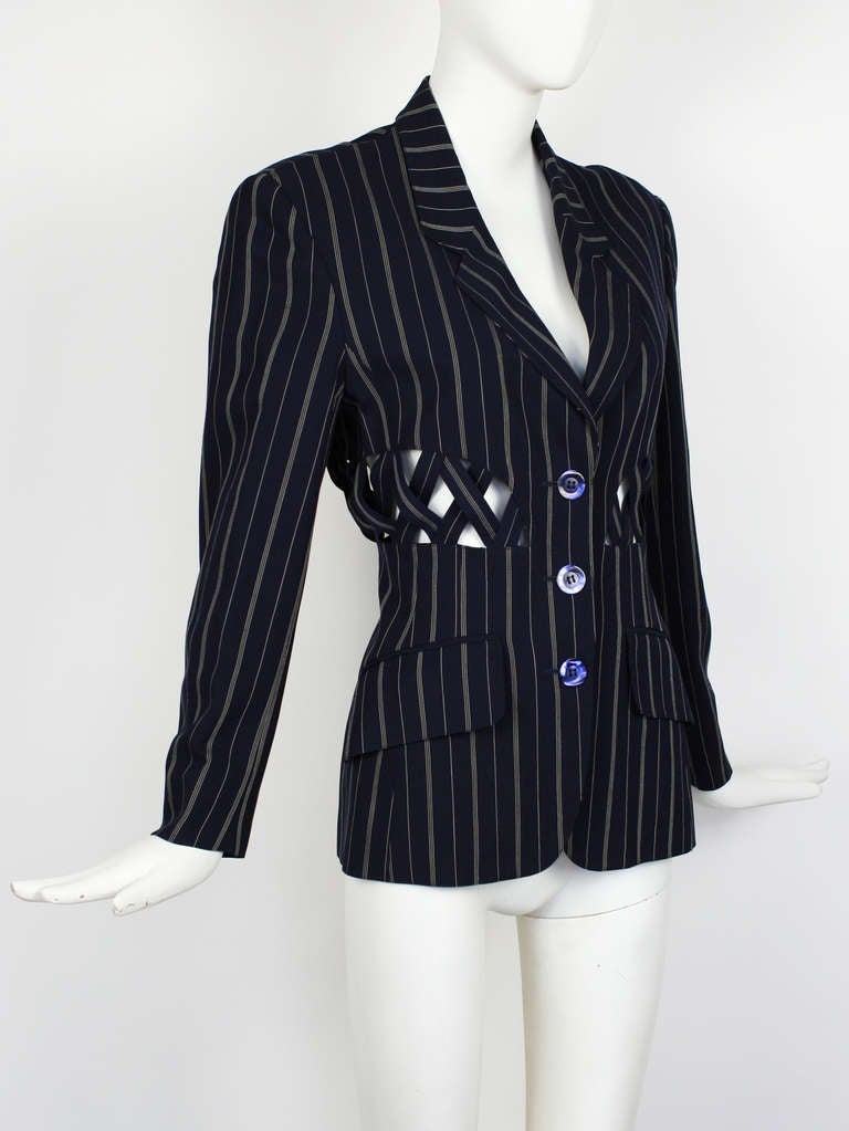 Lolita Lempicka Lattice Cut-Out Jacket. Pinstripe fabric with open lattice detail around the waist.
Excellent condition. Fits size medium. 

Bust:36