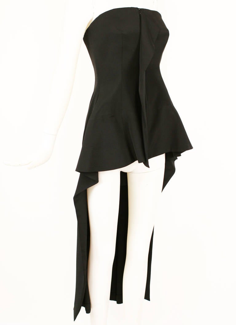 Yohji Yamamoto Asymmetrical Bustier
YOHJI YAMAMOTO black strapless evening dress/bustier style top.  Zipped down centre. Gathered at the back. 100% silk and 100% cotton,  Japan size 2, excellent, unworn condition.

Size Medium
Bust 36