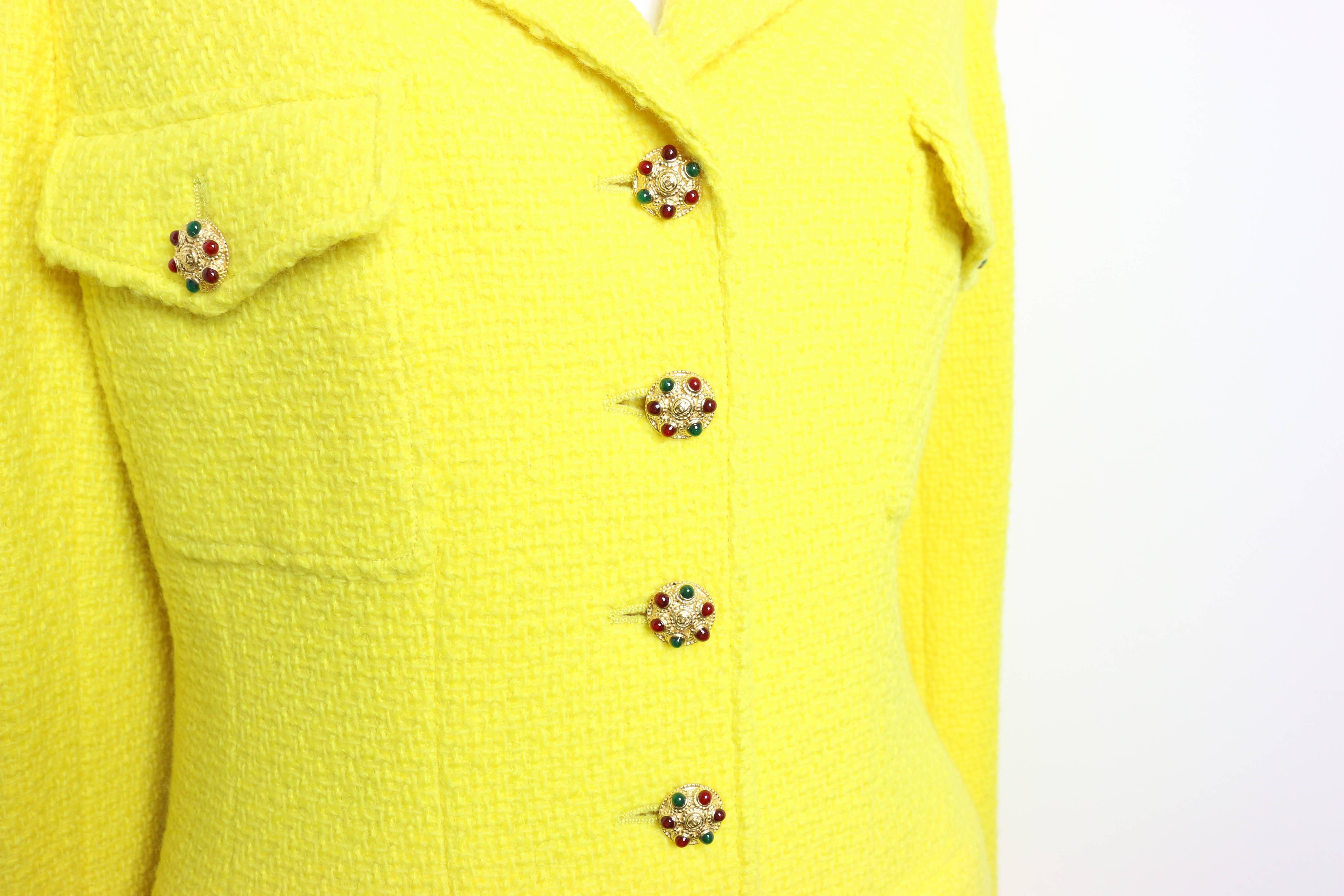 - This yellow Chanel jacket is beautifully constructed and features details such as 15 gold Gripoix buttons closure from Fall 1996 collection.  

- Four flap pockets with Gripoix button closure. Three Gripoix button closure on cuff. 

 - Gold-plated