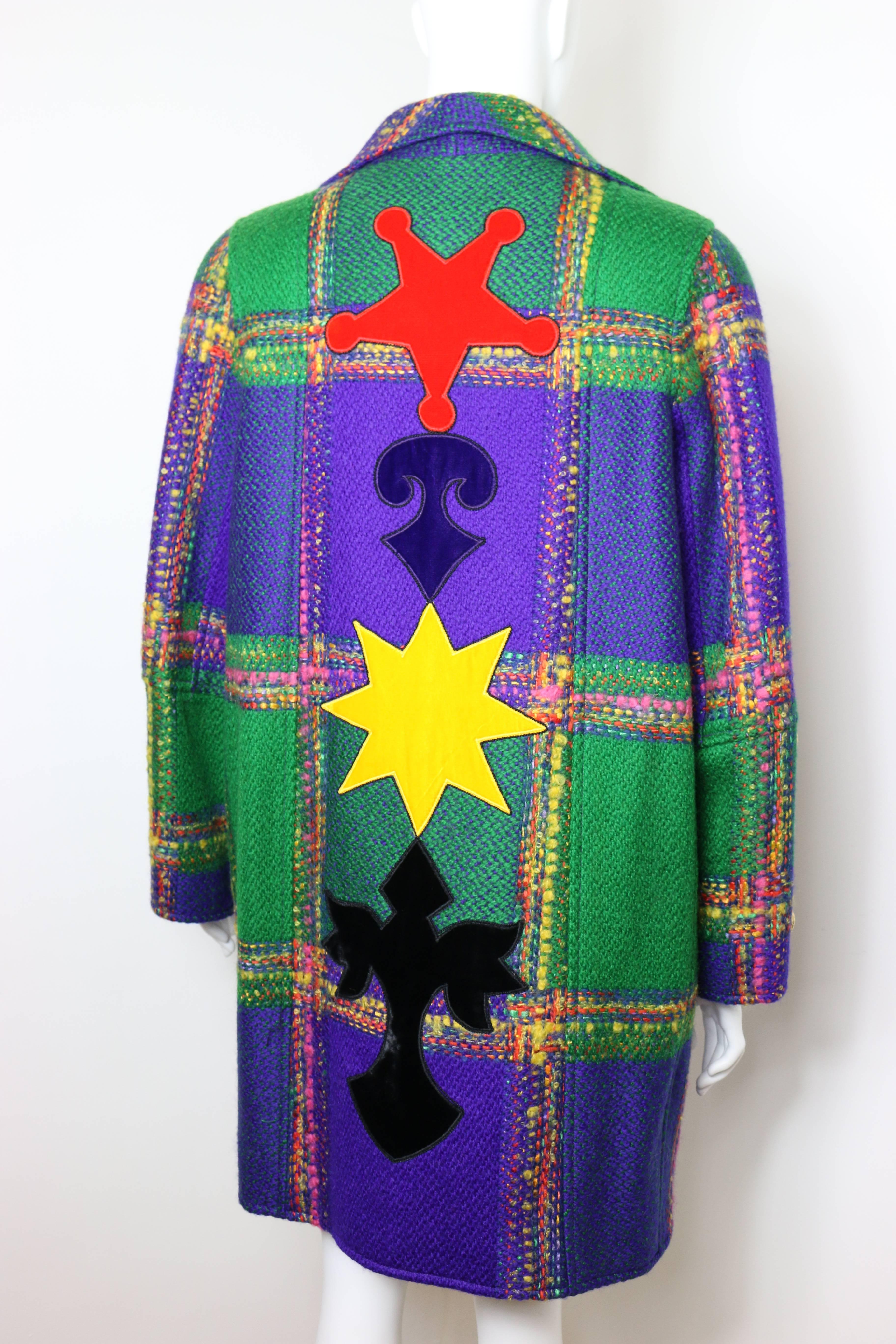 - This beautiful and rare find early 90s Christian Lacroix multi-coloured wool tweed plaid coat is one of a kind!

- This coat is straight cut 80s slightly bigger silhouette.

- Featuring thirteen gold gripoix buttons in front and 

- Colourful